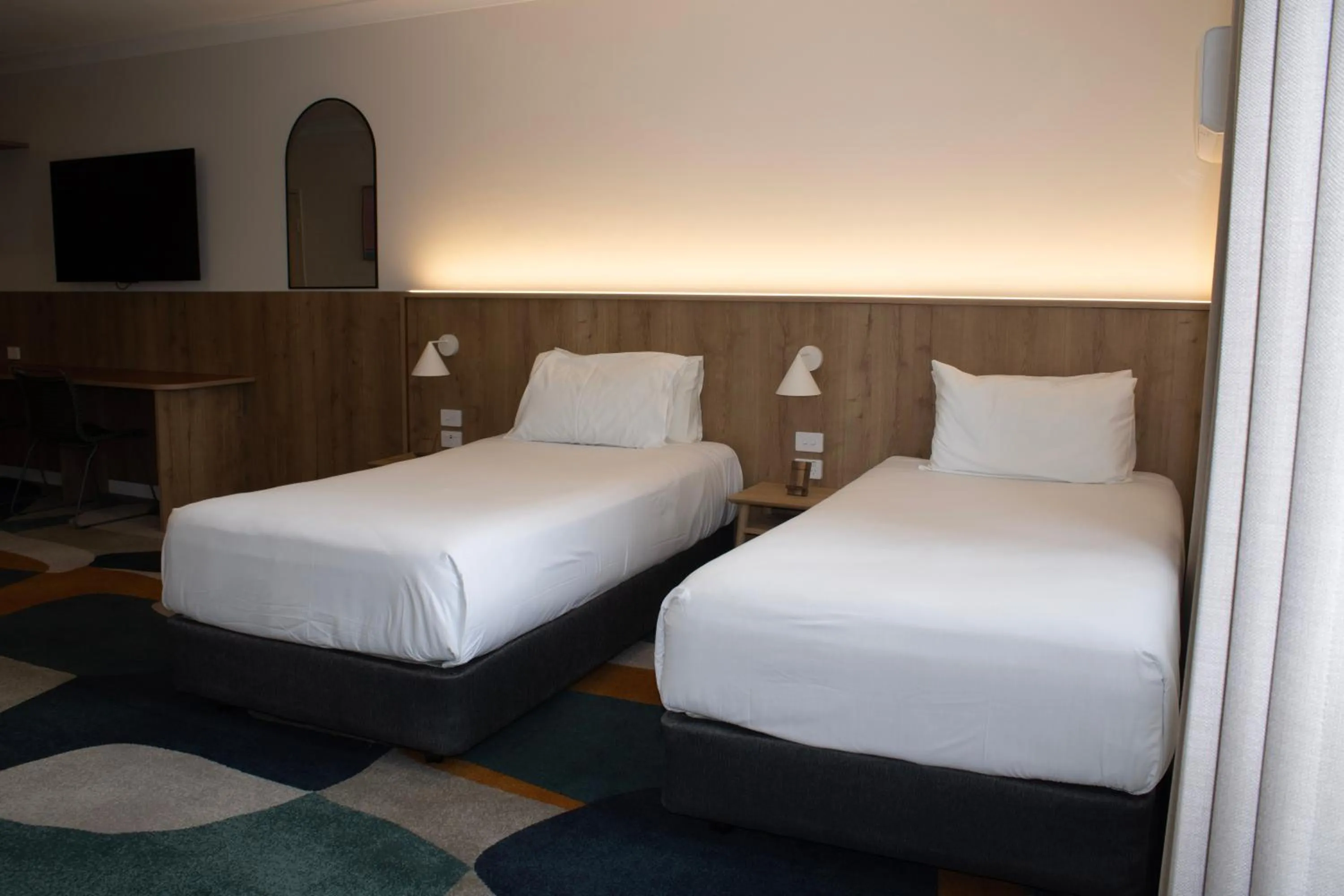 Bed in Seabreeze Beach Hotel