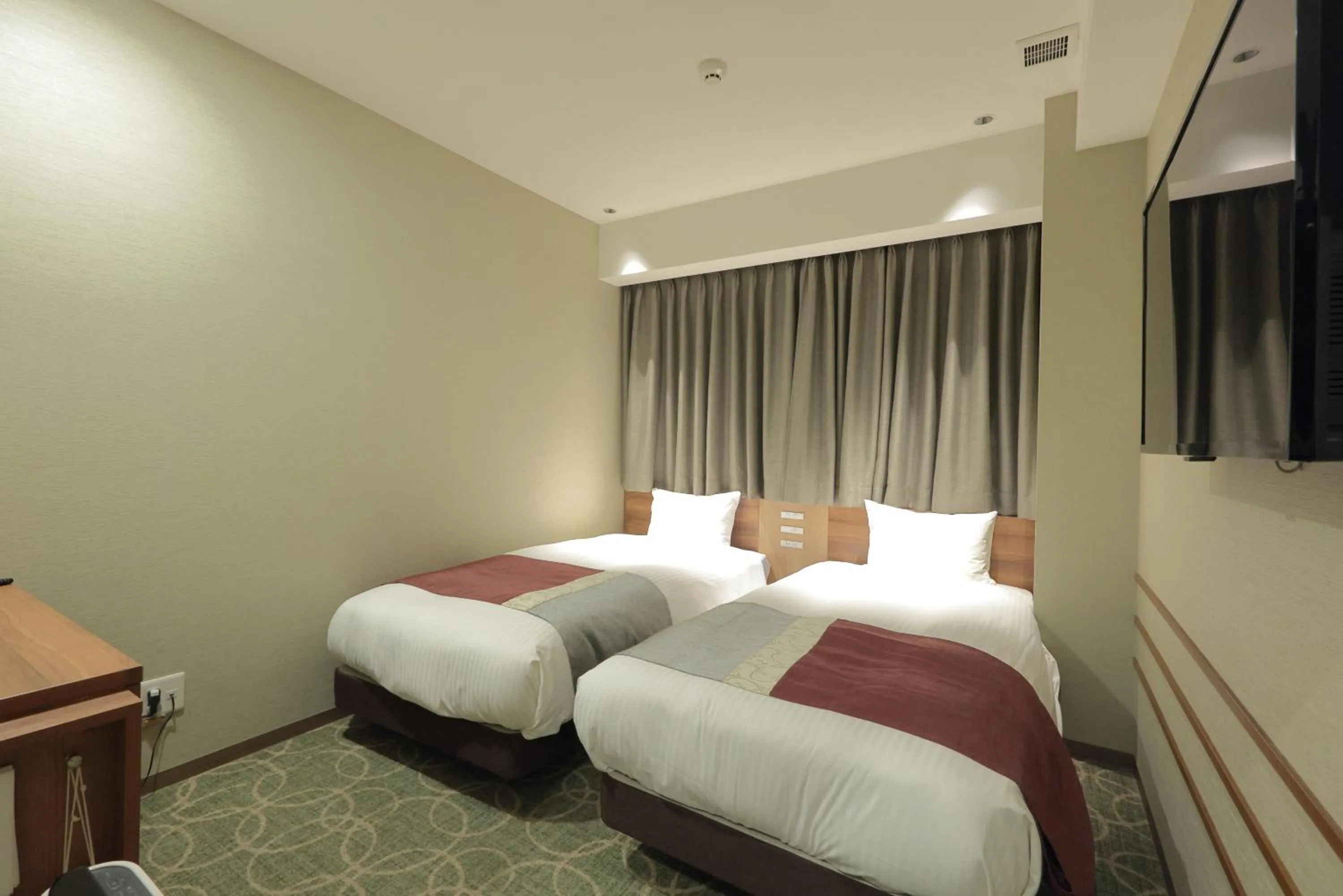 Bed in Shinsaibashi Grand Hotel Osaka