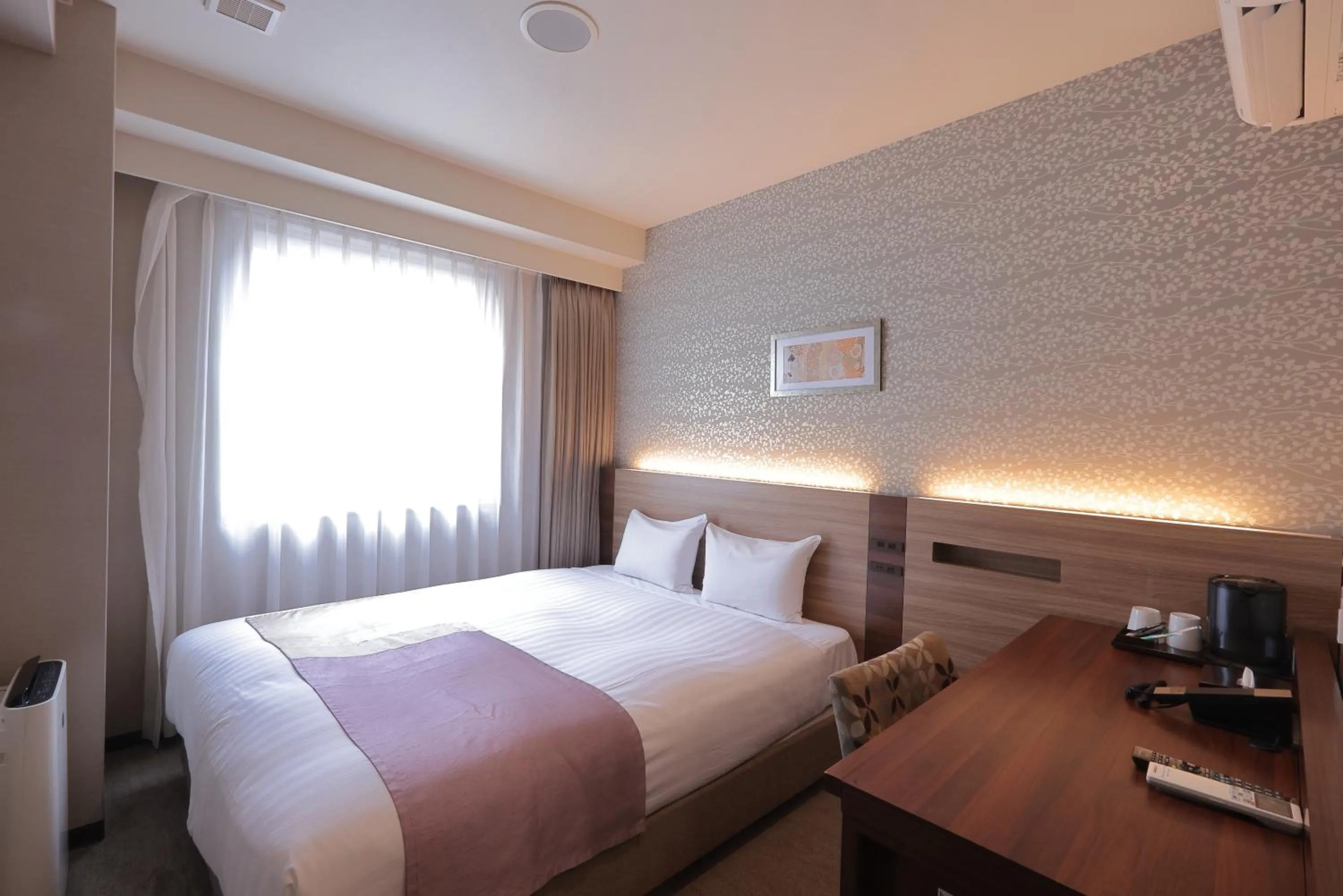 Bed in Shinsaibashi Grand Hotel Osaka