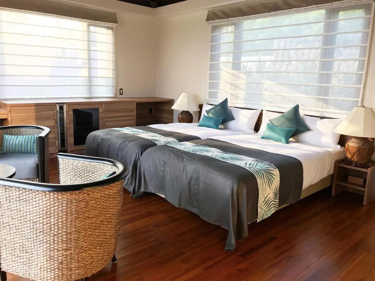 Bed in Villabu Resort