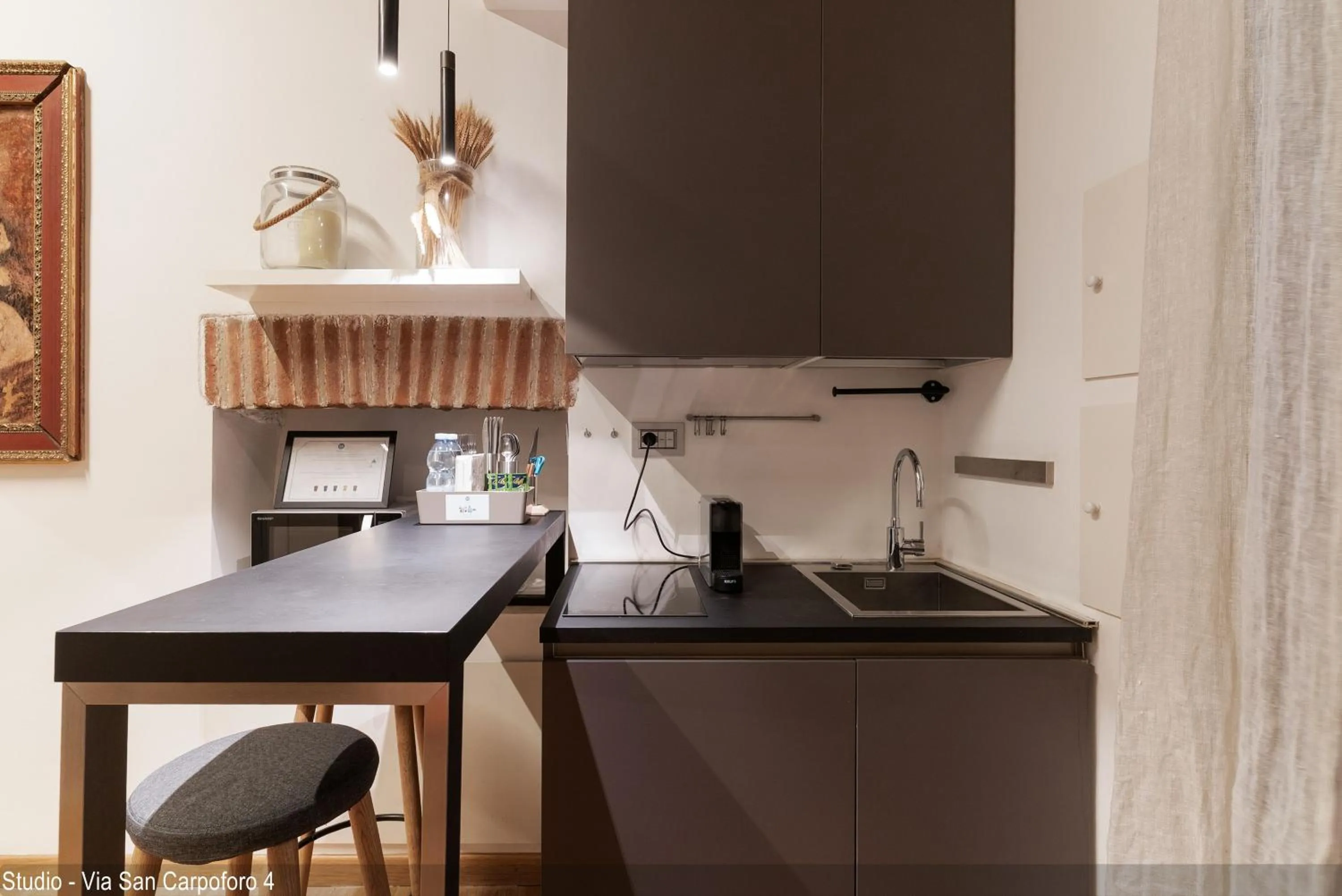 Kitchen or kitchenette in Brera Apartments