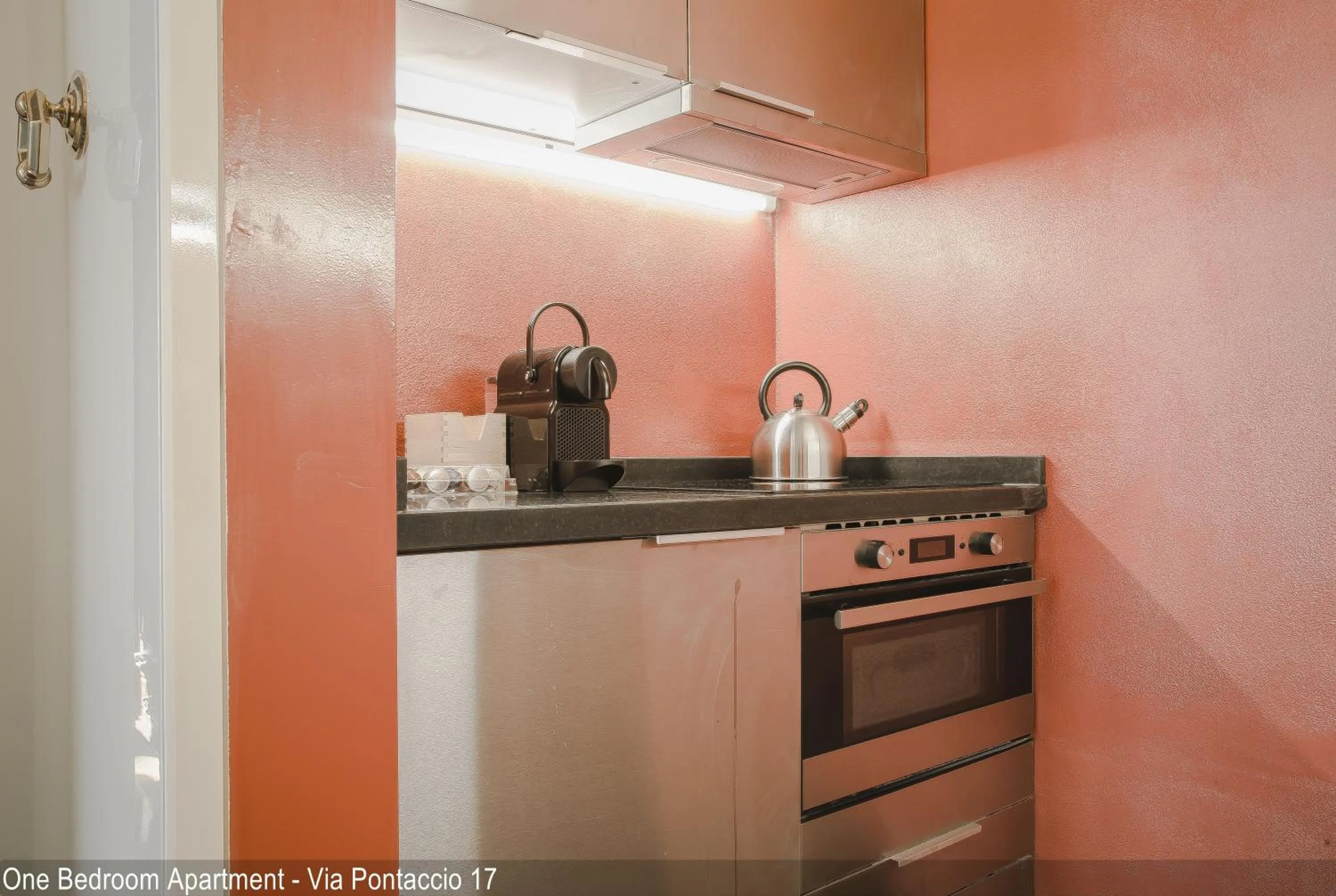 Kitchen or kitchenette in Brera Apartments