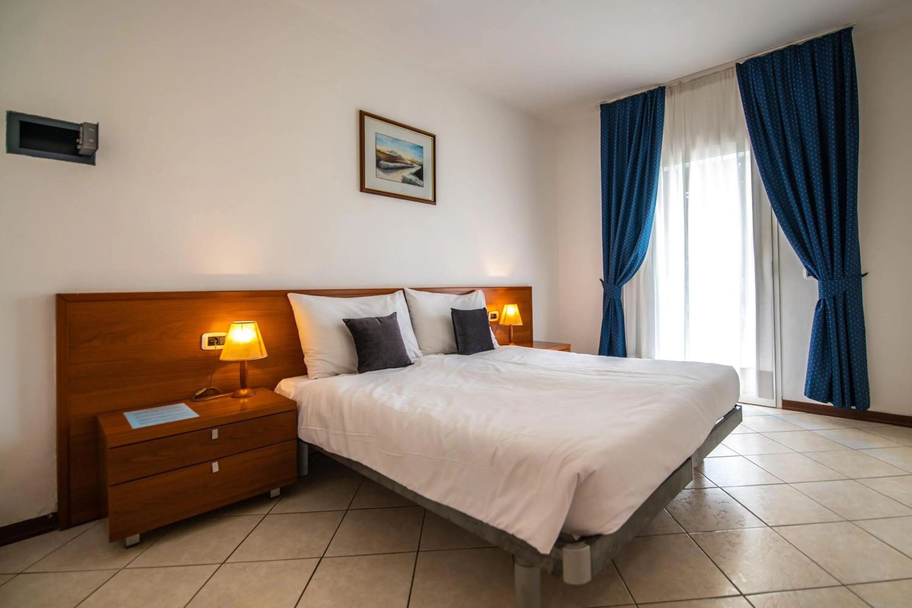 Photo of the whole room, Bed in Ai Pini Medulin Resort