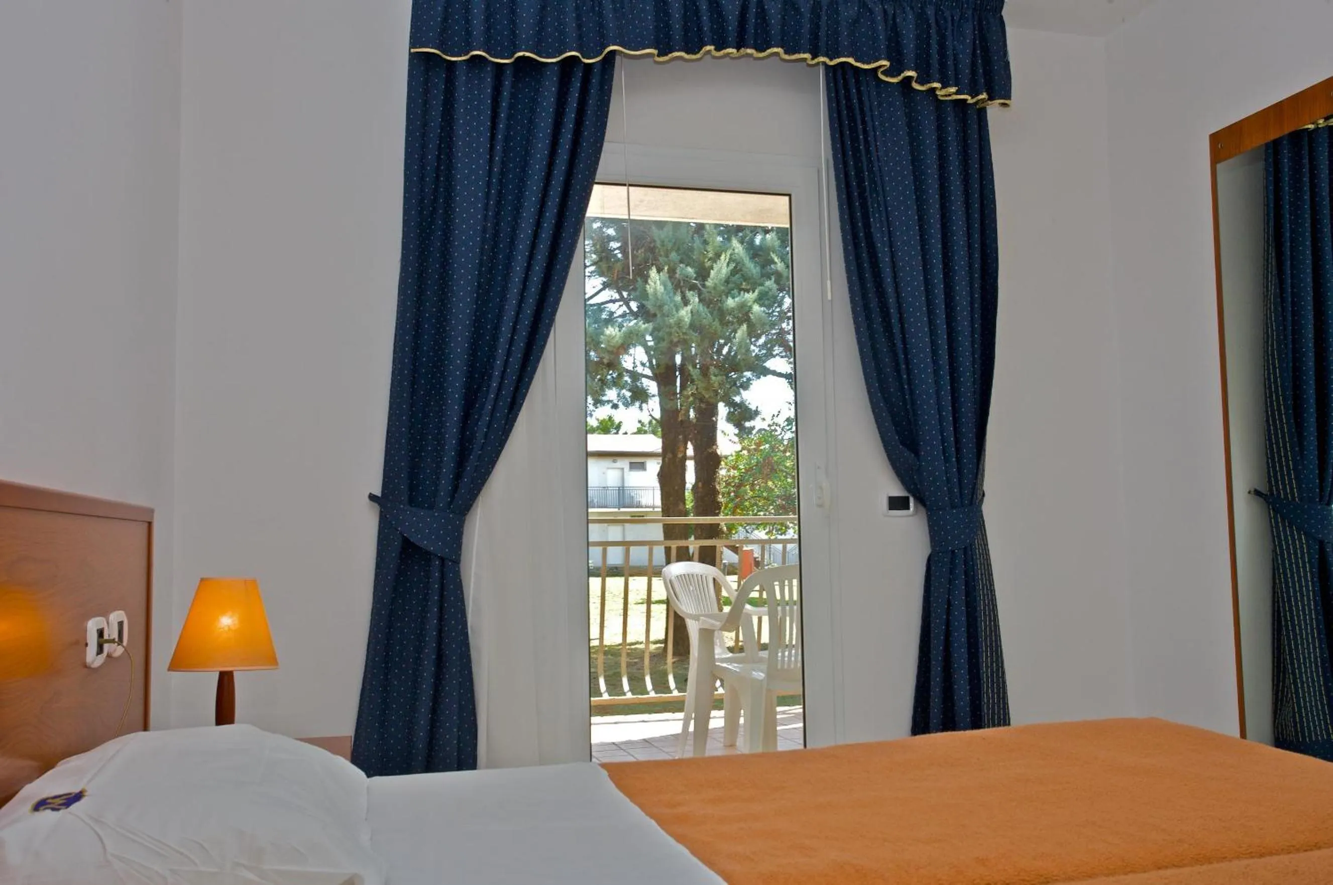 Photo of the whole room, Bed in Ai Pini Medulin Resort