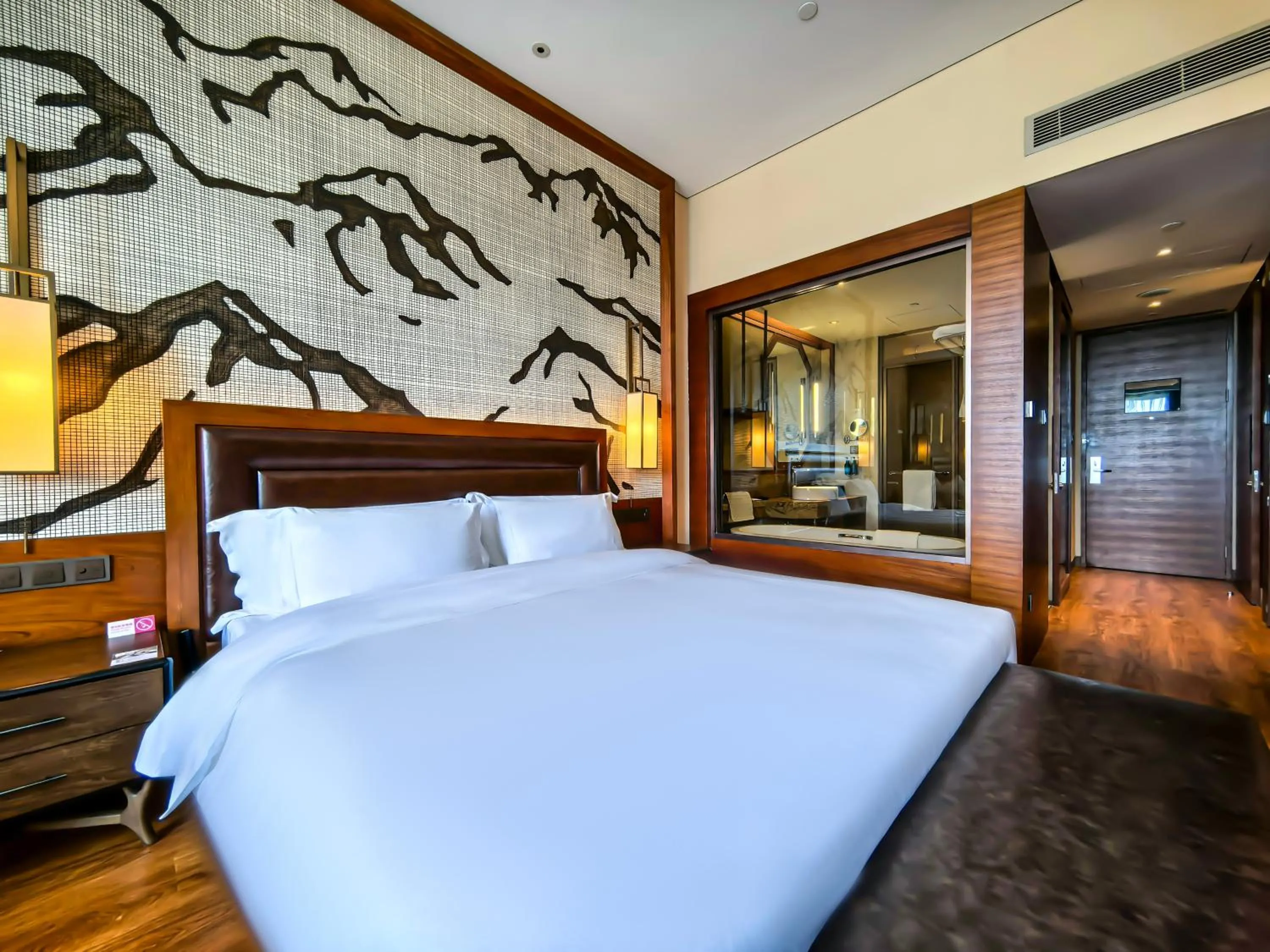 Bed in Crowne Plaza Resort Changbaishan Hot Spring by IHG