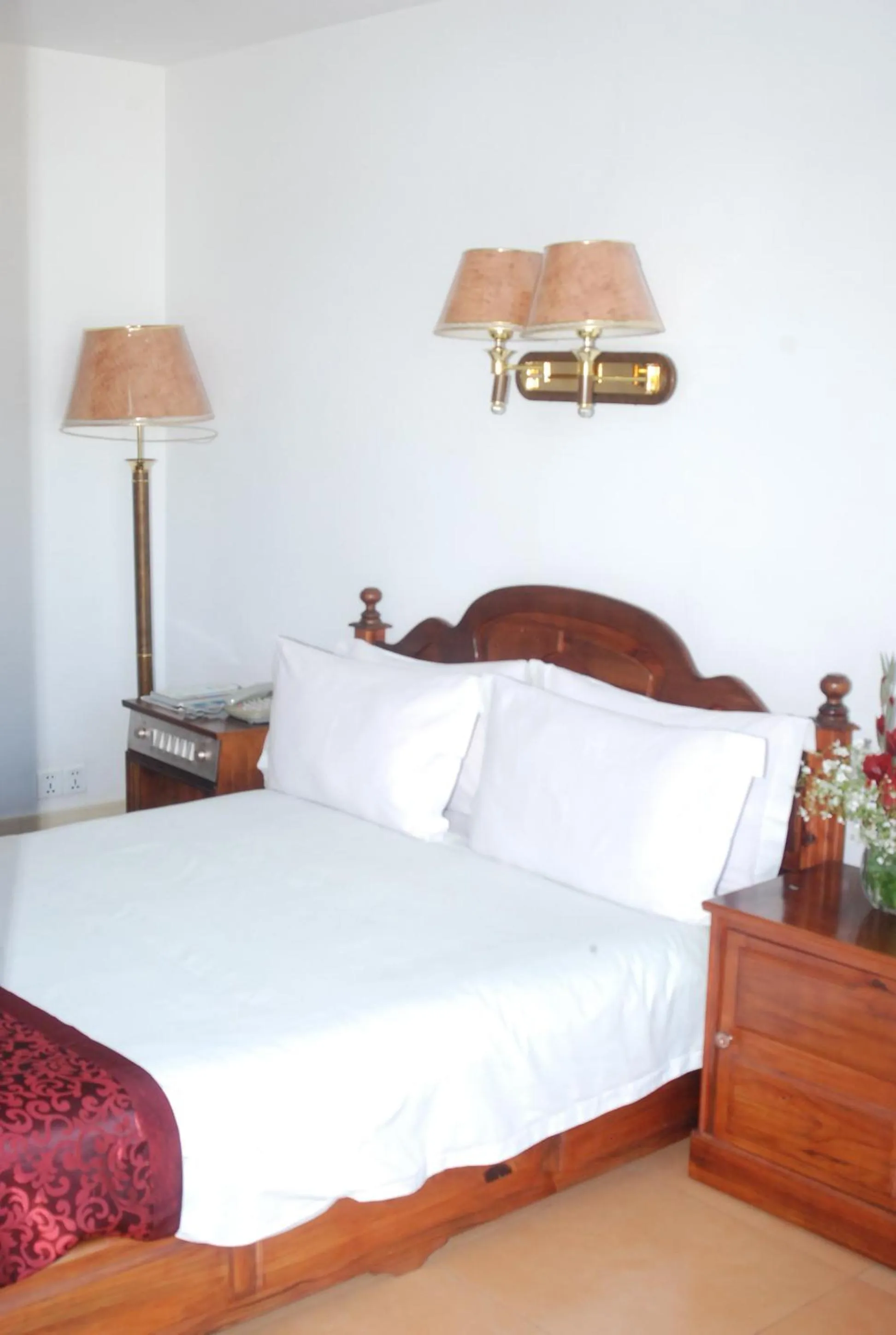 Bed in Evergreen Hotel