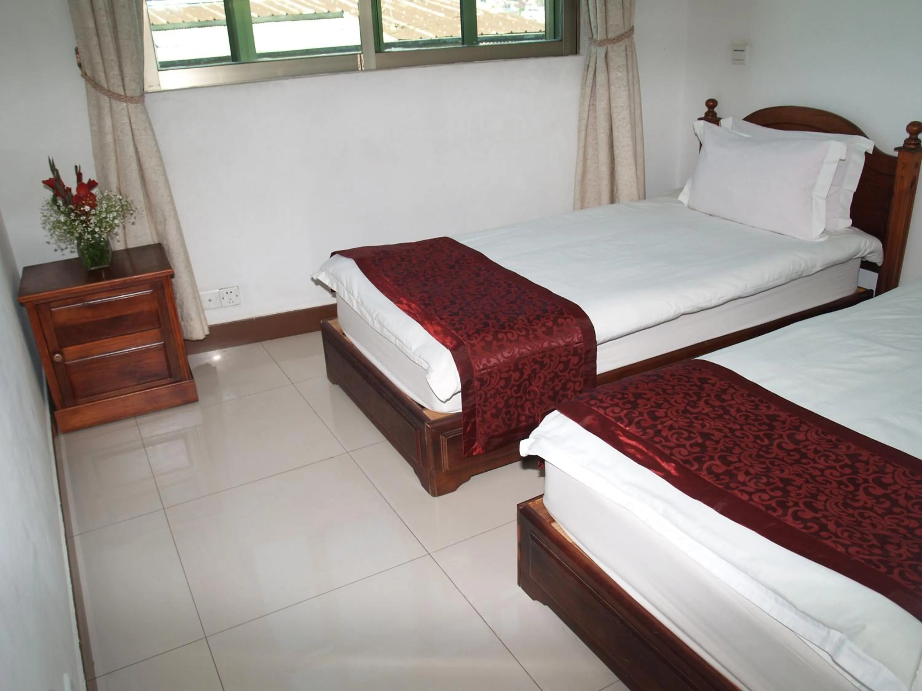 Bed in Evergreen Hotel