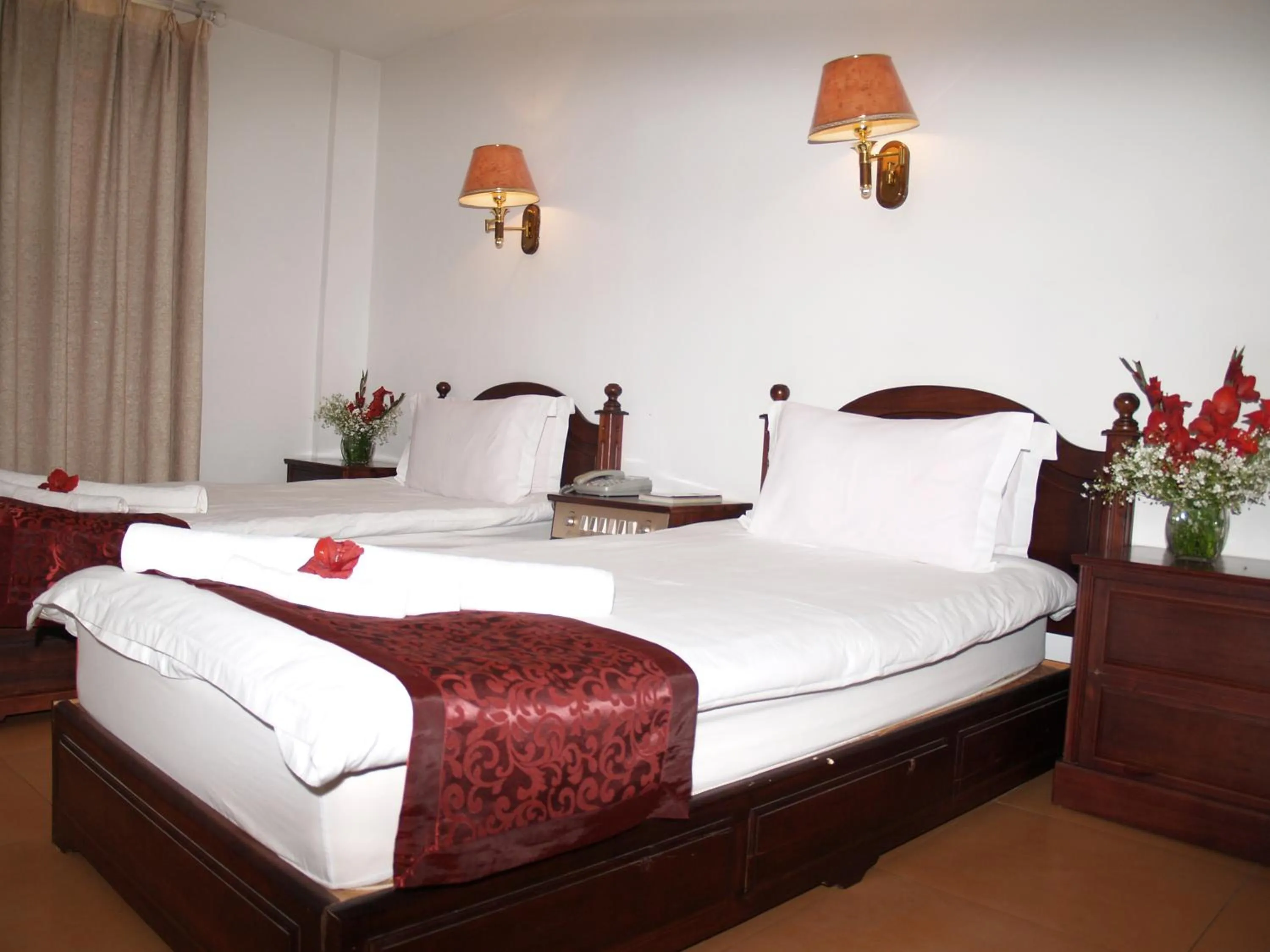 Bed in Evergreen Hotel