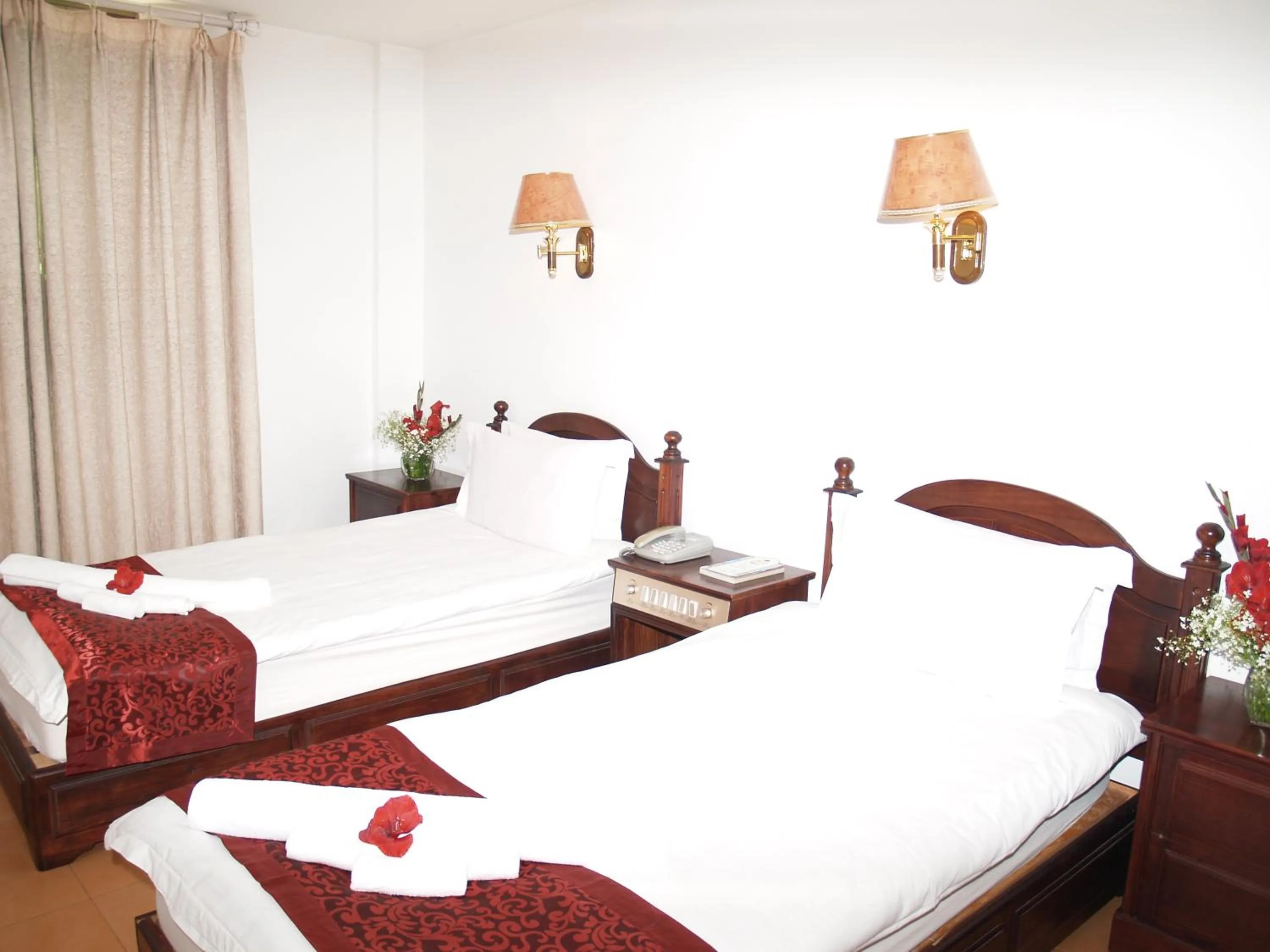 Bed in Evergreen Hotel