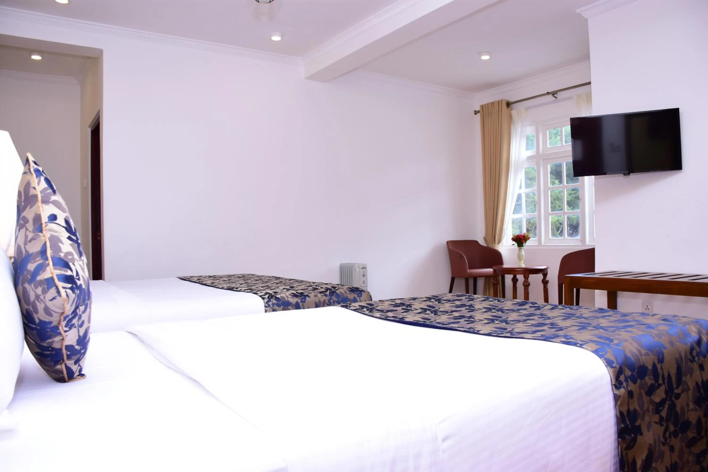 Bed in Mirage Kings Cottage