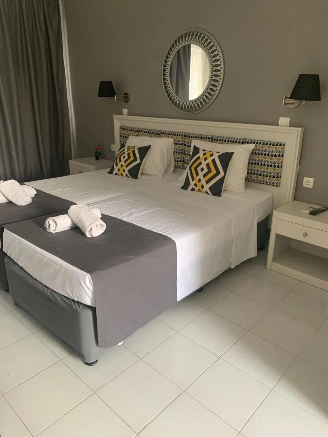 Bed in Alkyonides Boutique Hotel