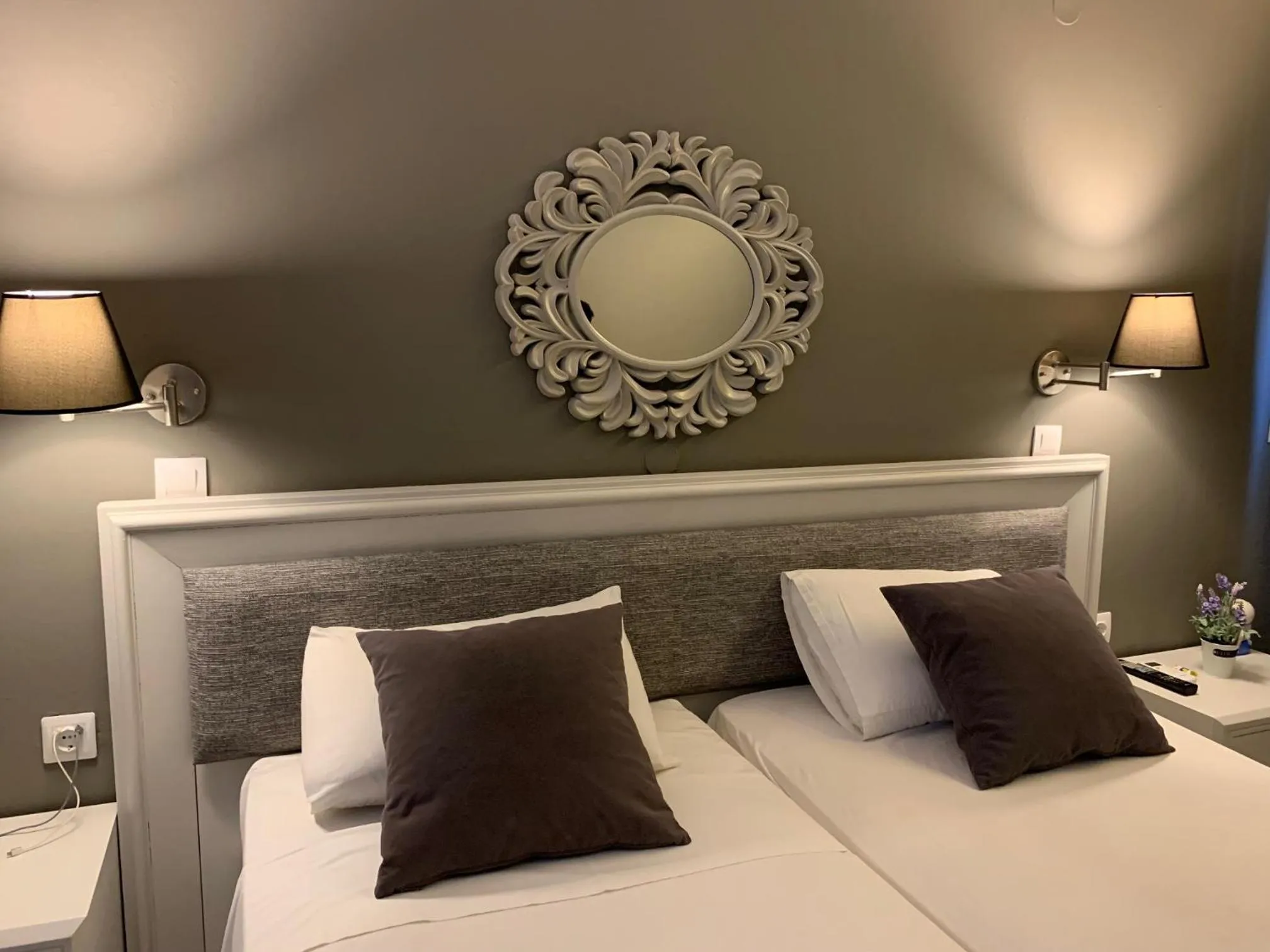 Bed in Alkyonides Boutique Hotel