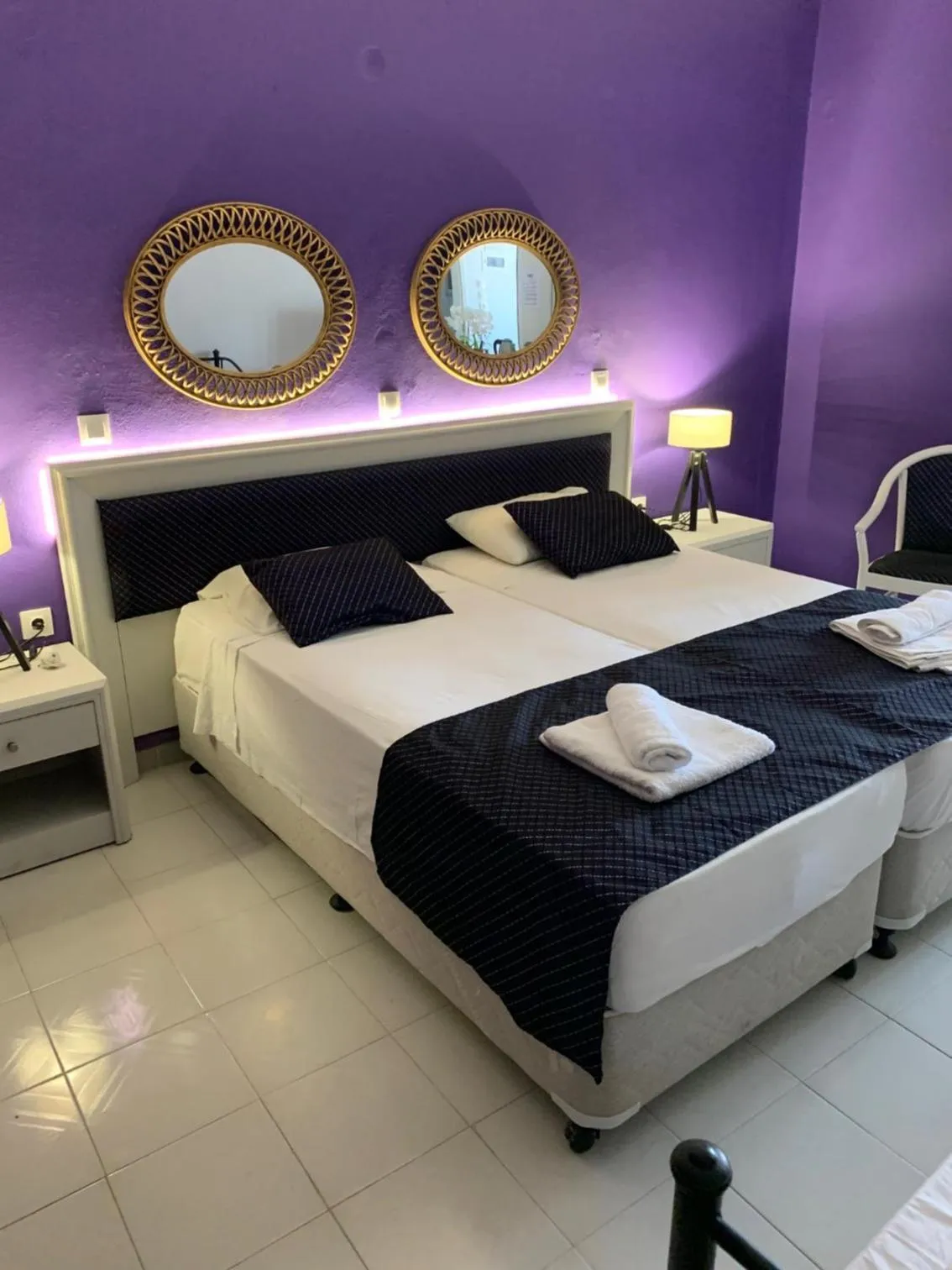 Bed in Alkyonides Boutique Hotel