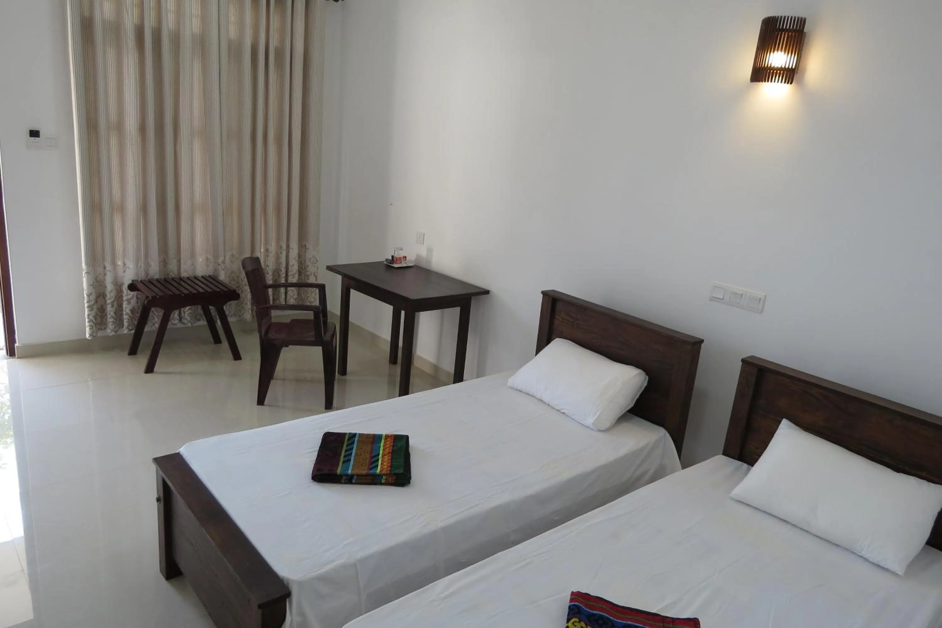 Photo of the whole room, Bed in Sailors Mirissa