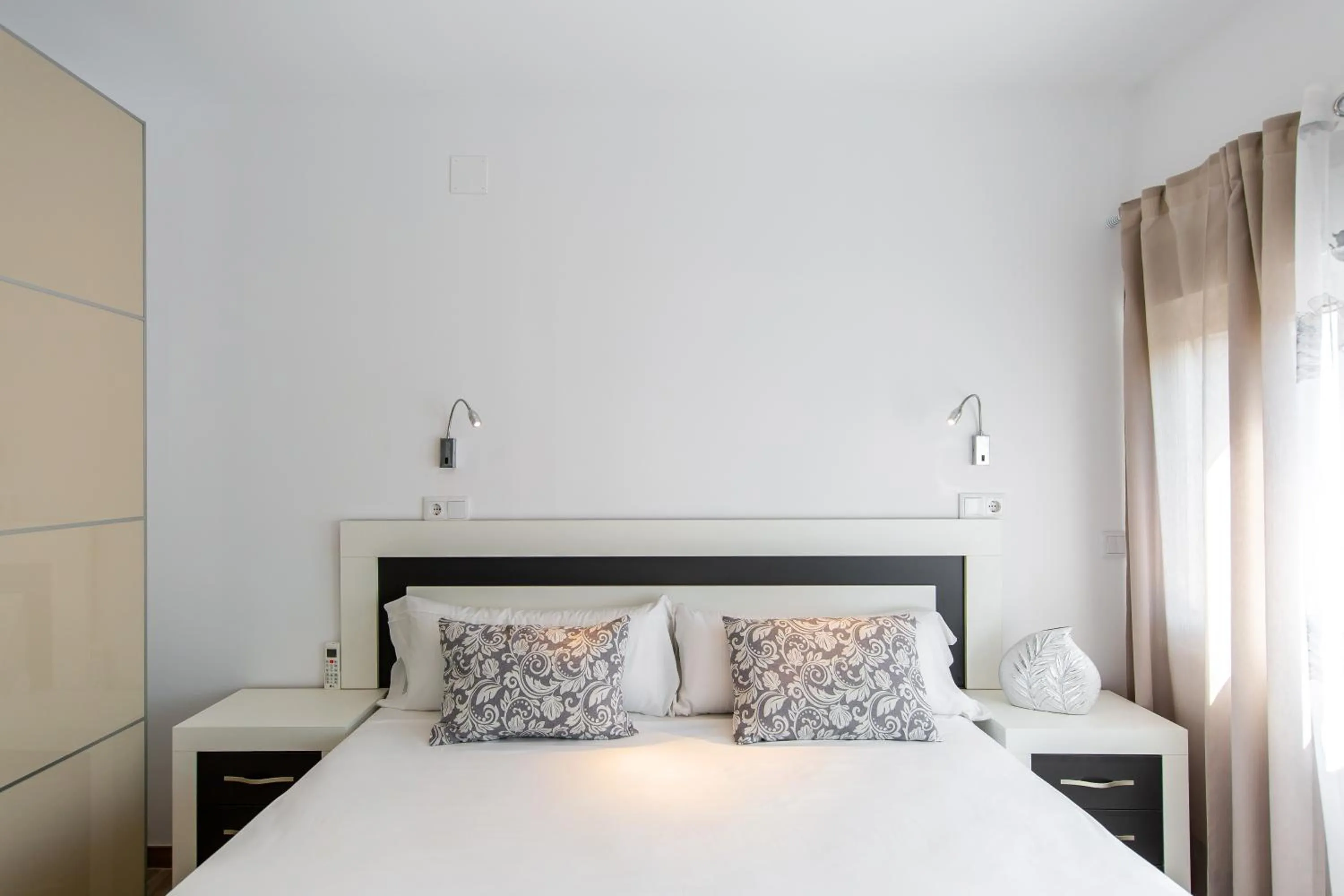 Bed in Sonrisa Apartments