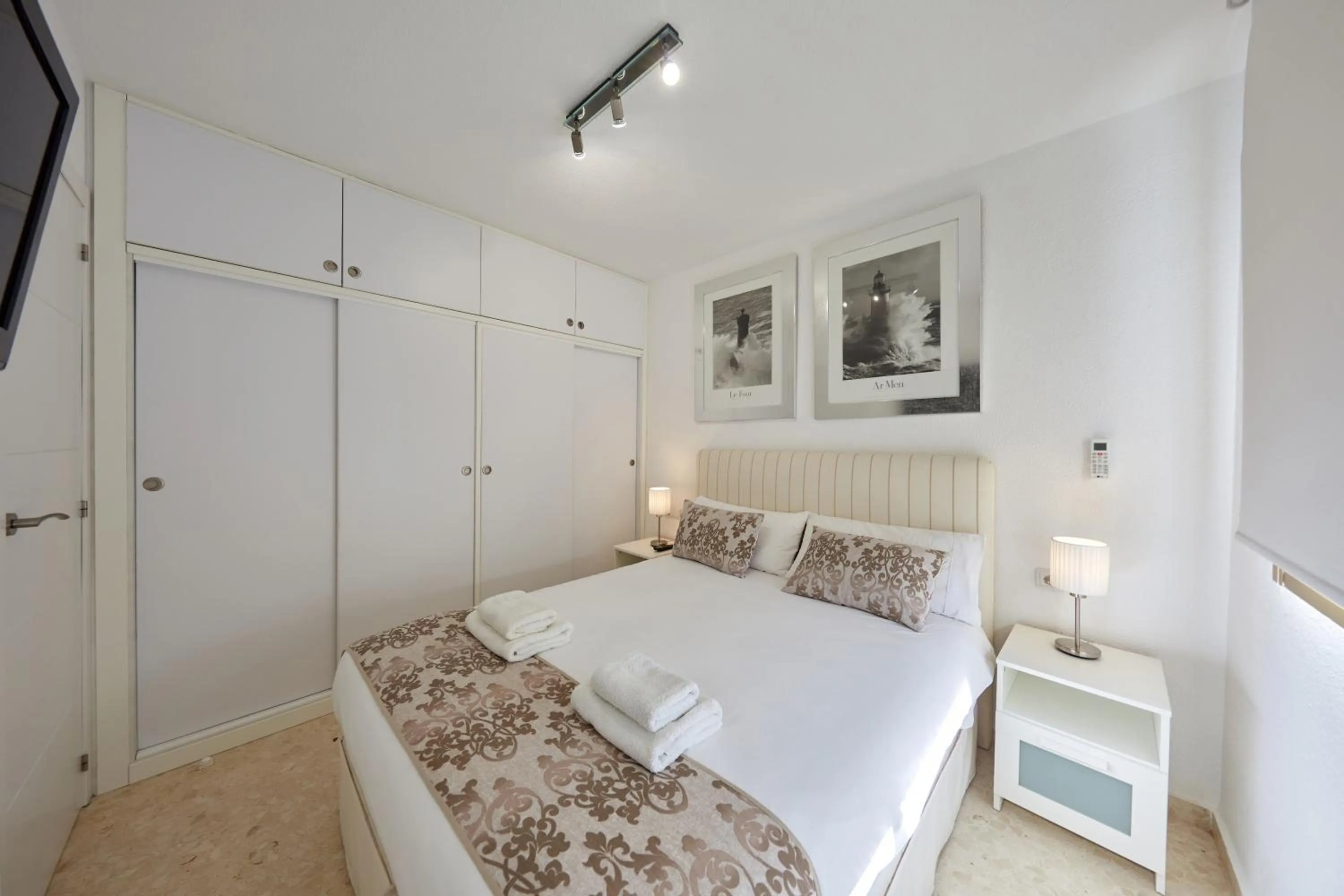 Bed in Sonrisa Apartments