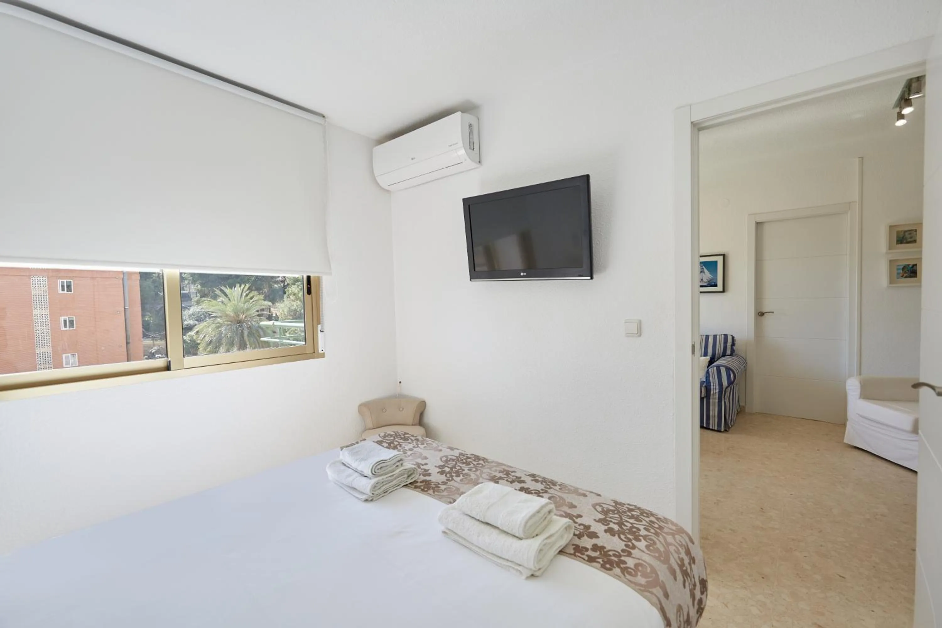 Bed in Sonrisa Apartments