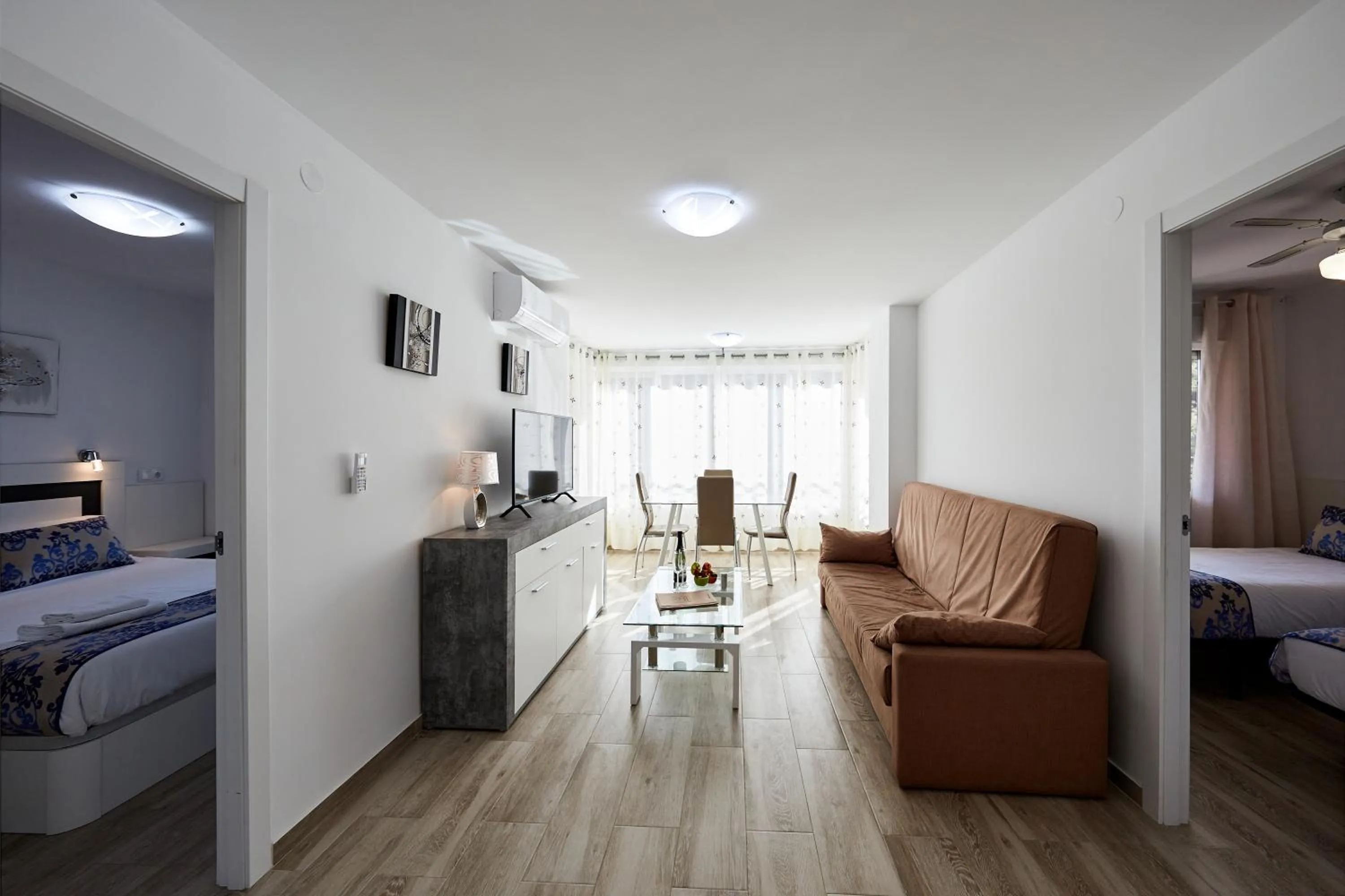 Living room, Bed in Sonrisa Apartments