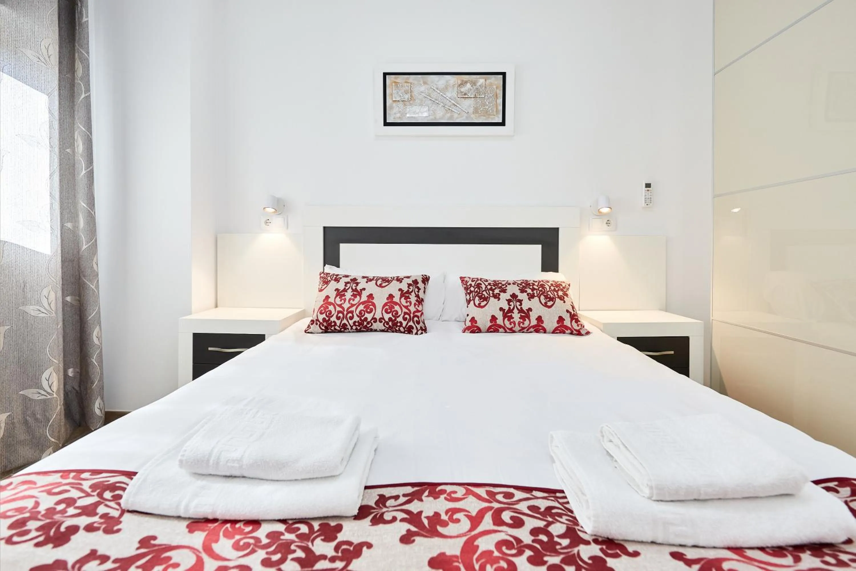 Bed in Sonrisa Apartments