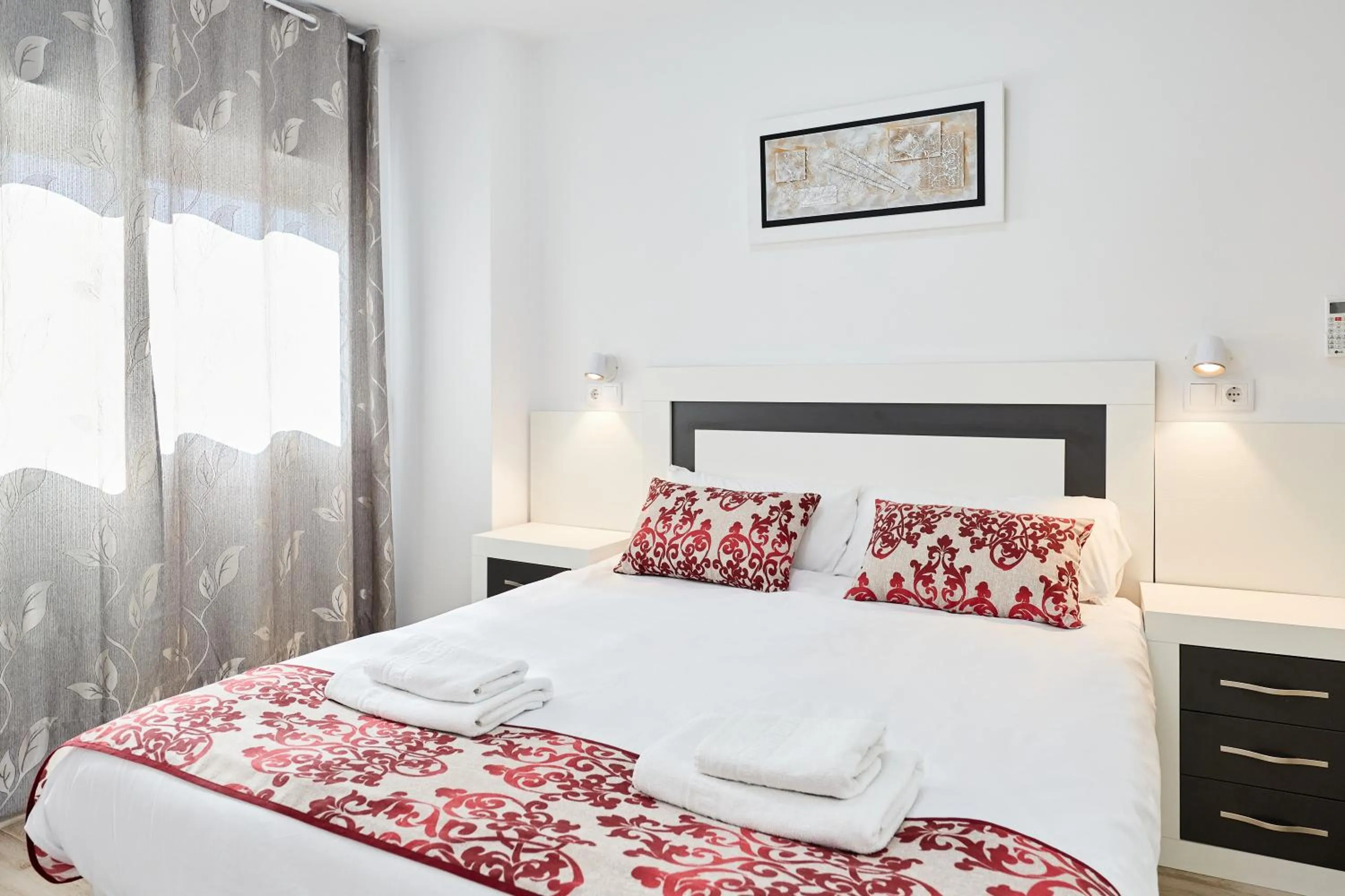 Bed in Sonrisa Apartments