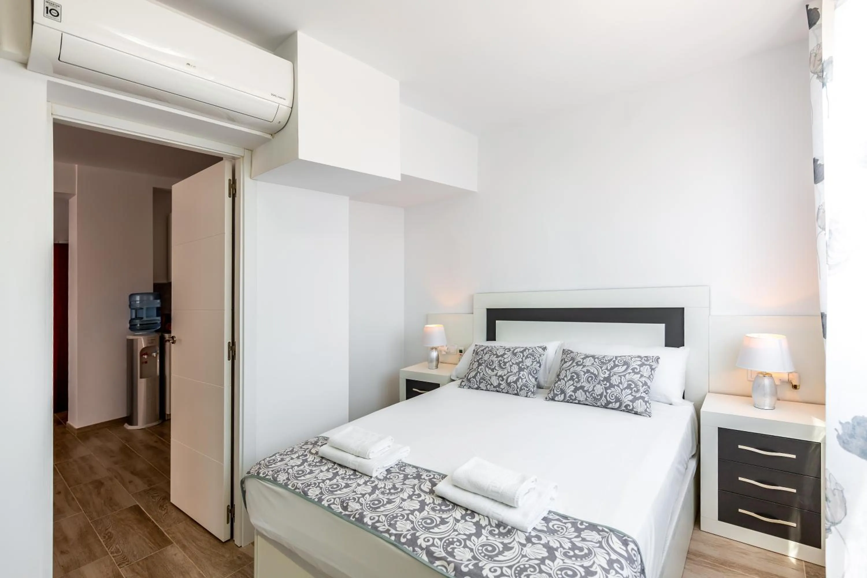 Bed in Sonrisa Apartments