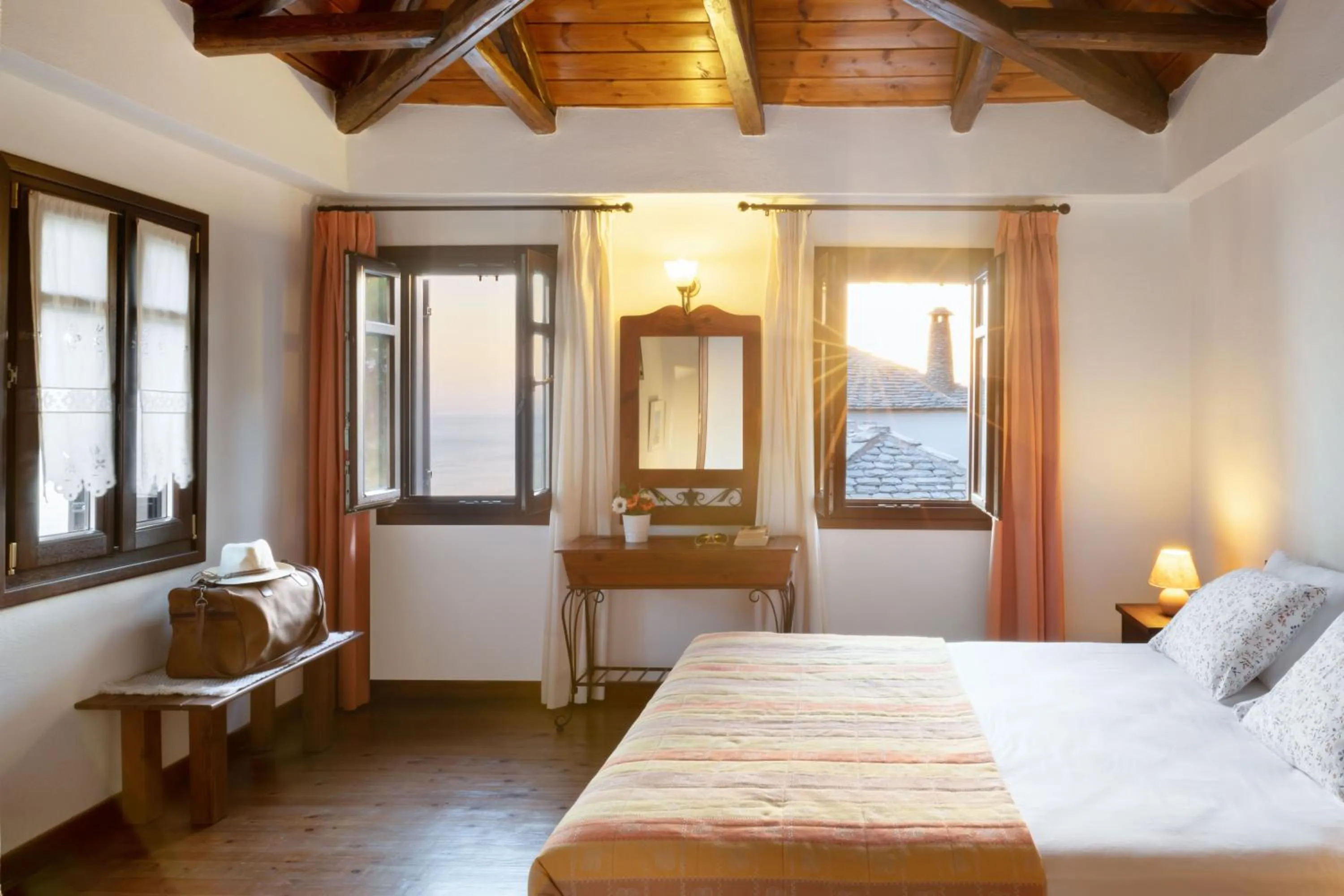 Bed in Esperos Suites & Villas