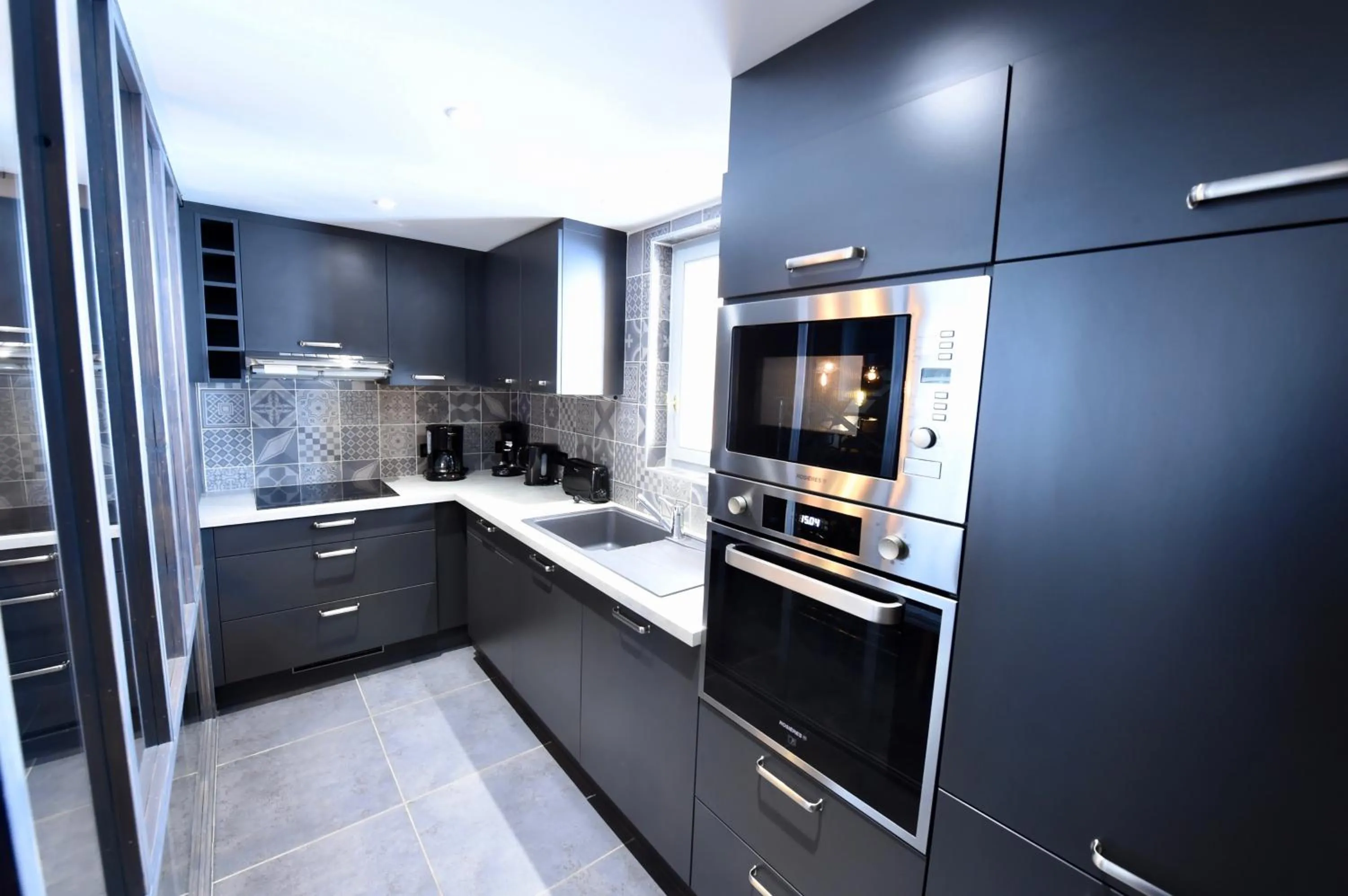 Kitchen or kitchenette in Au Selaou 34