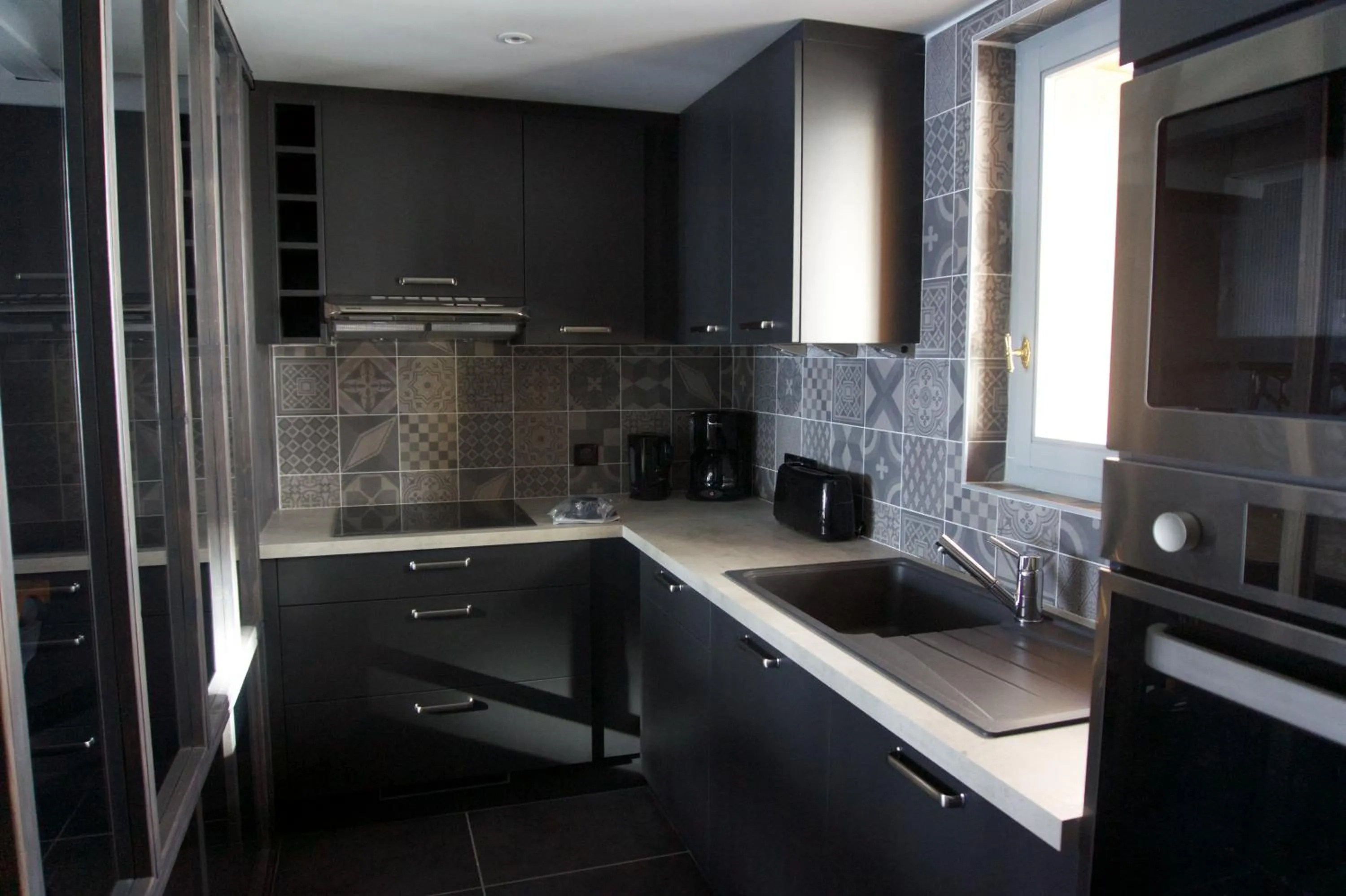 Kitchen or kitchenette in Au Selaou 34