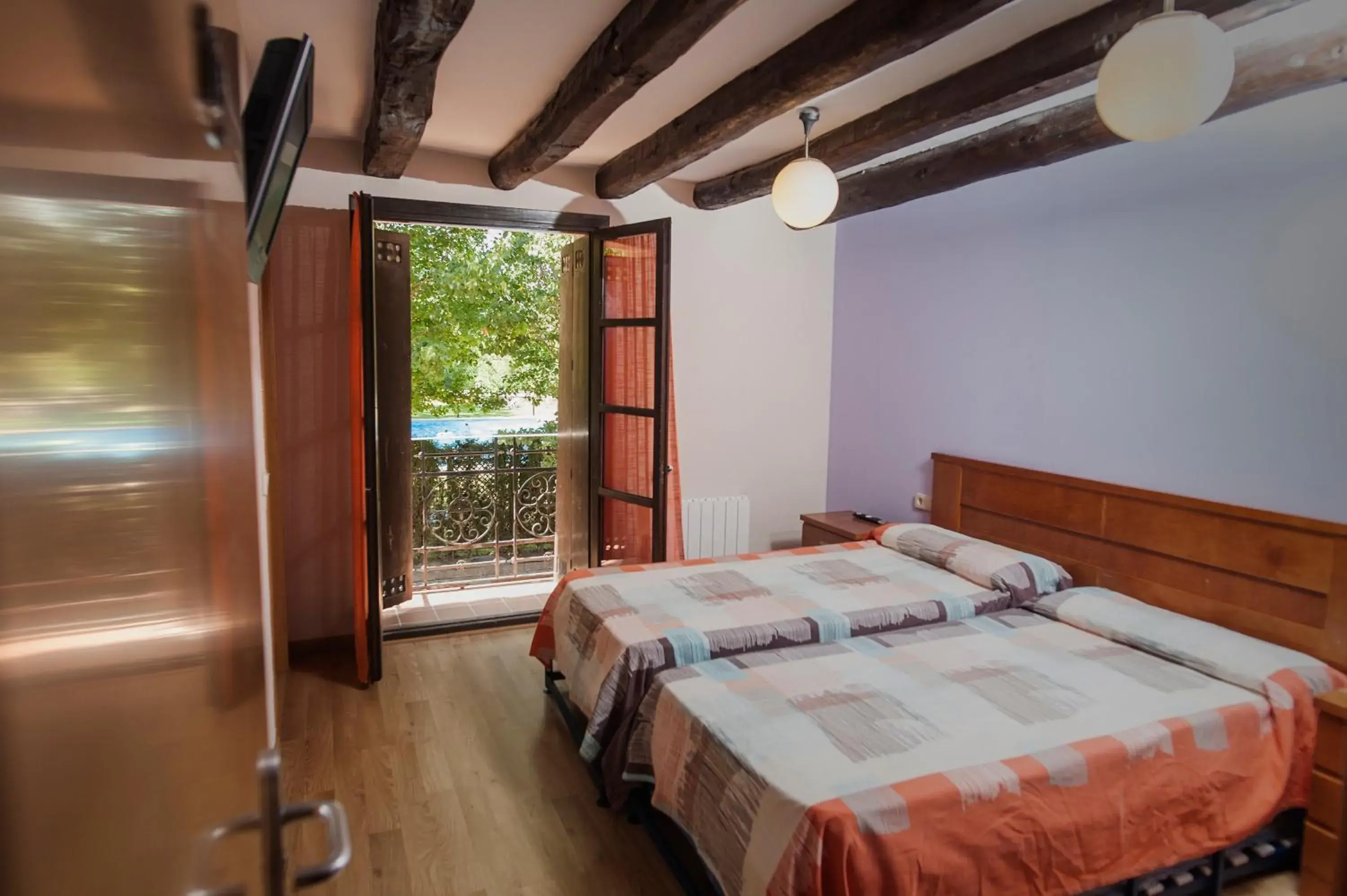 Bed in La Pedanía Hotel Y Bungalows - Ligüerre de Cinca Bed in La Pedanía Hotel Y Bungalows - Ligüerre de Cinca