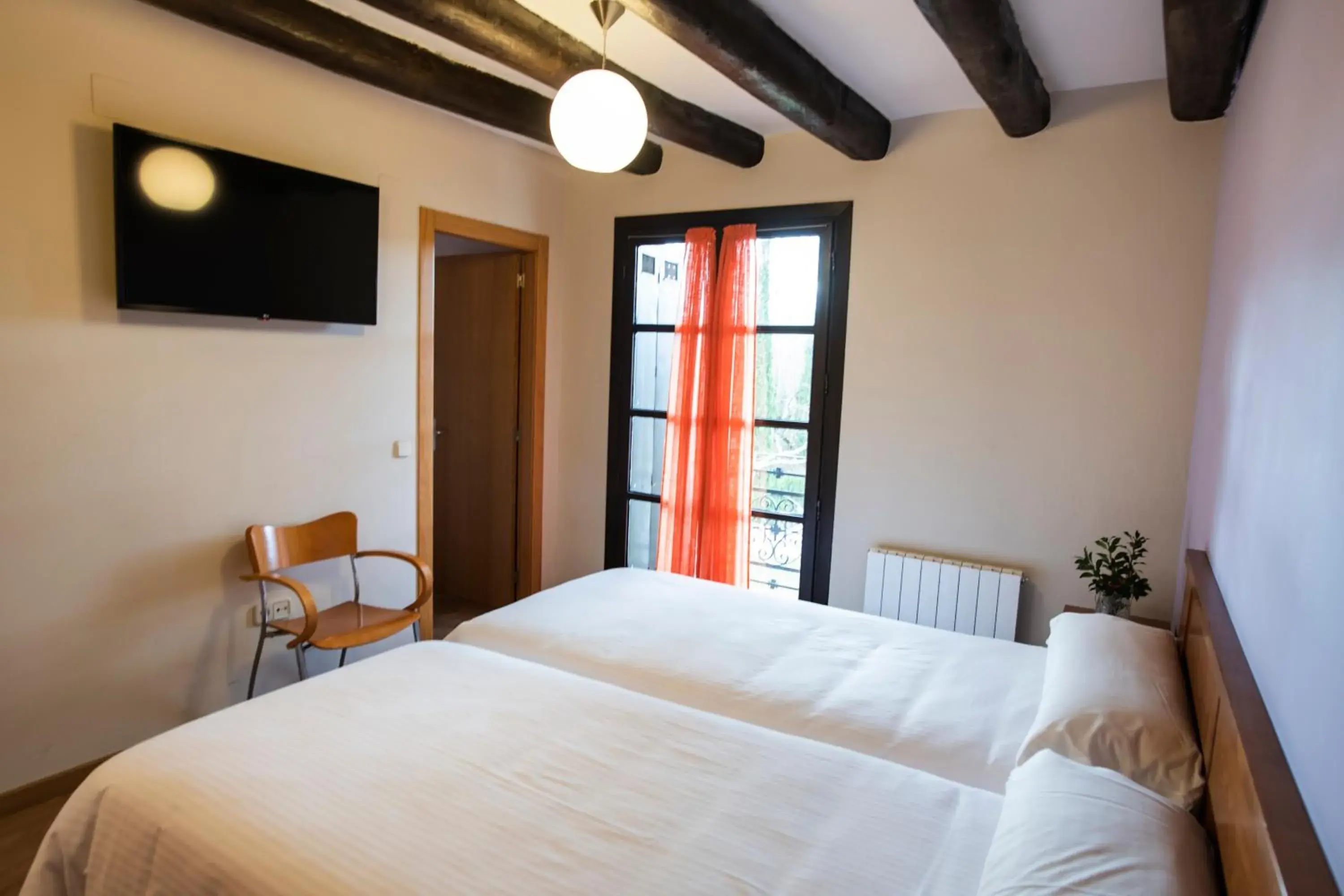 Bed in La Pedanía Hotel Y Bungalows - Ligüerre de Cinca Bed in La Pedanía Hotel Y Bungalows - Ligüerre de Cinca