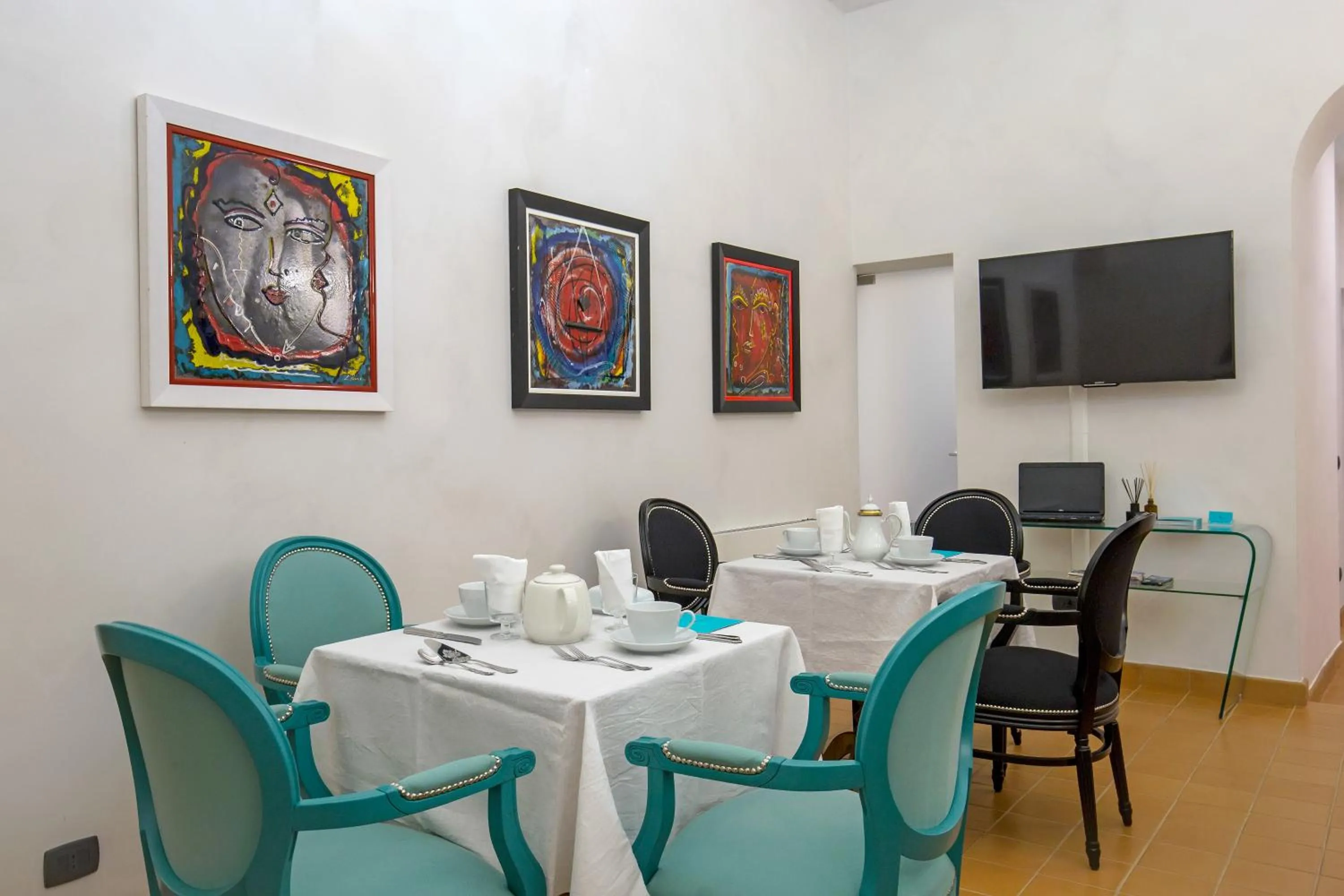 Communal lounge/ TV room in B&B Luxury Scacciaventi