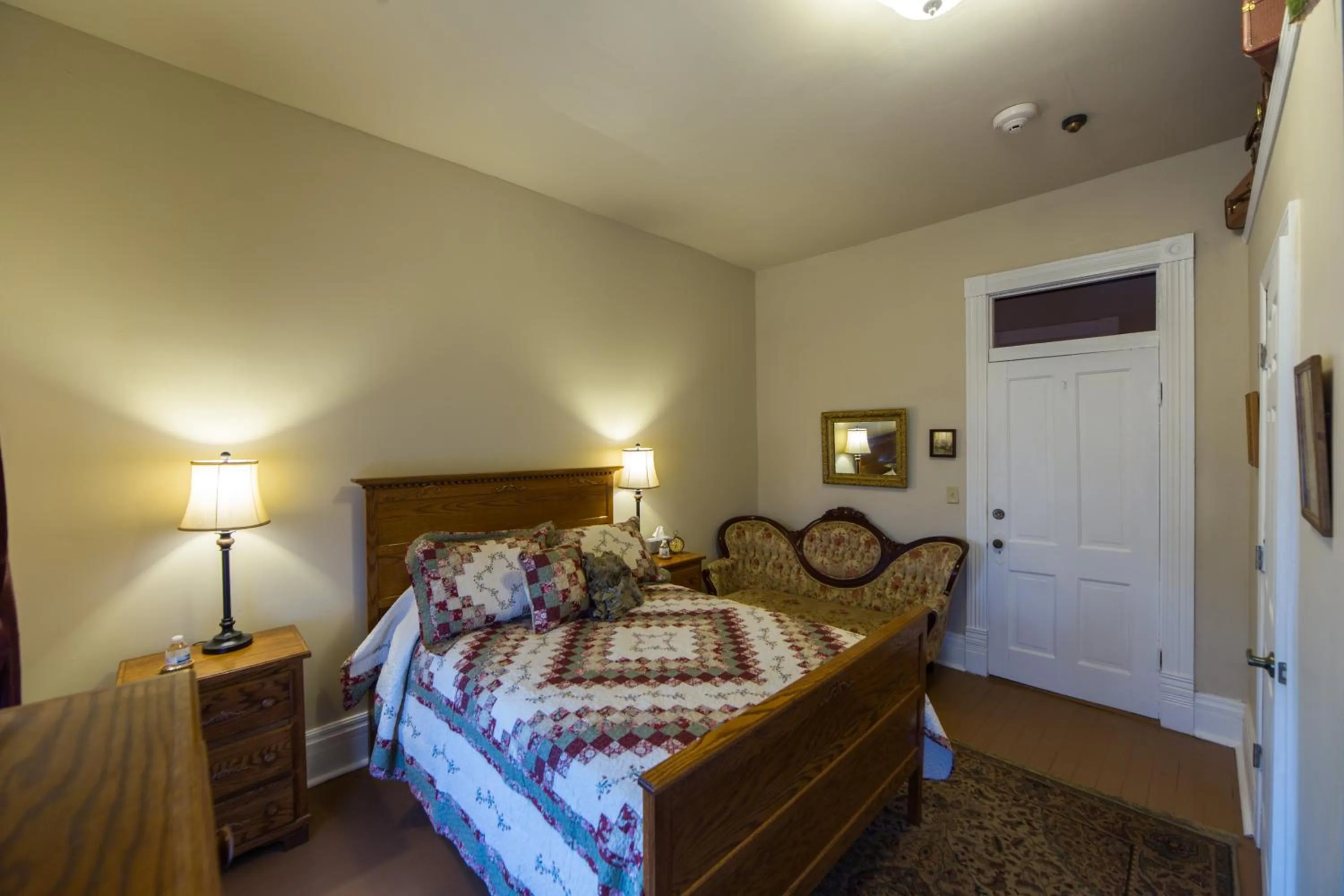 Decorative detail, Bed in Grand Victorian Inn