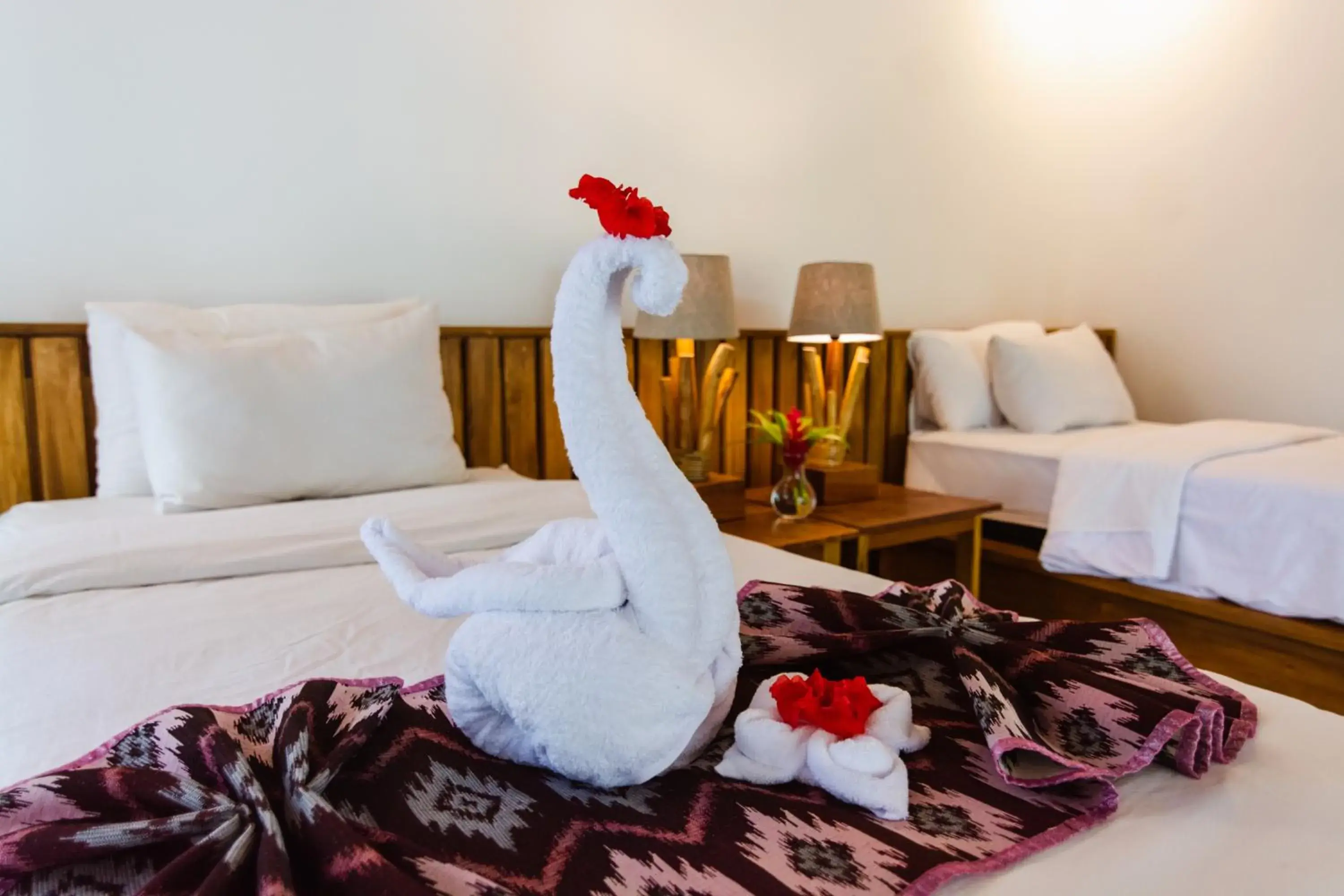 Bed in Murex Dive Resort Bed in Murex Dive Resort