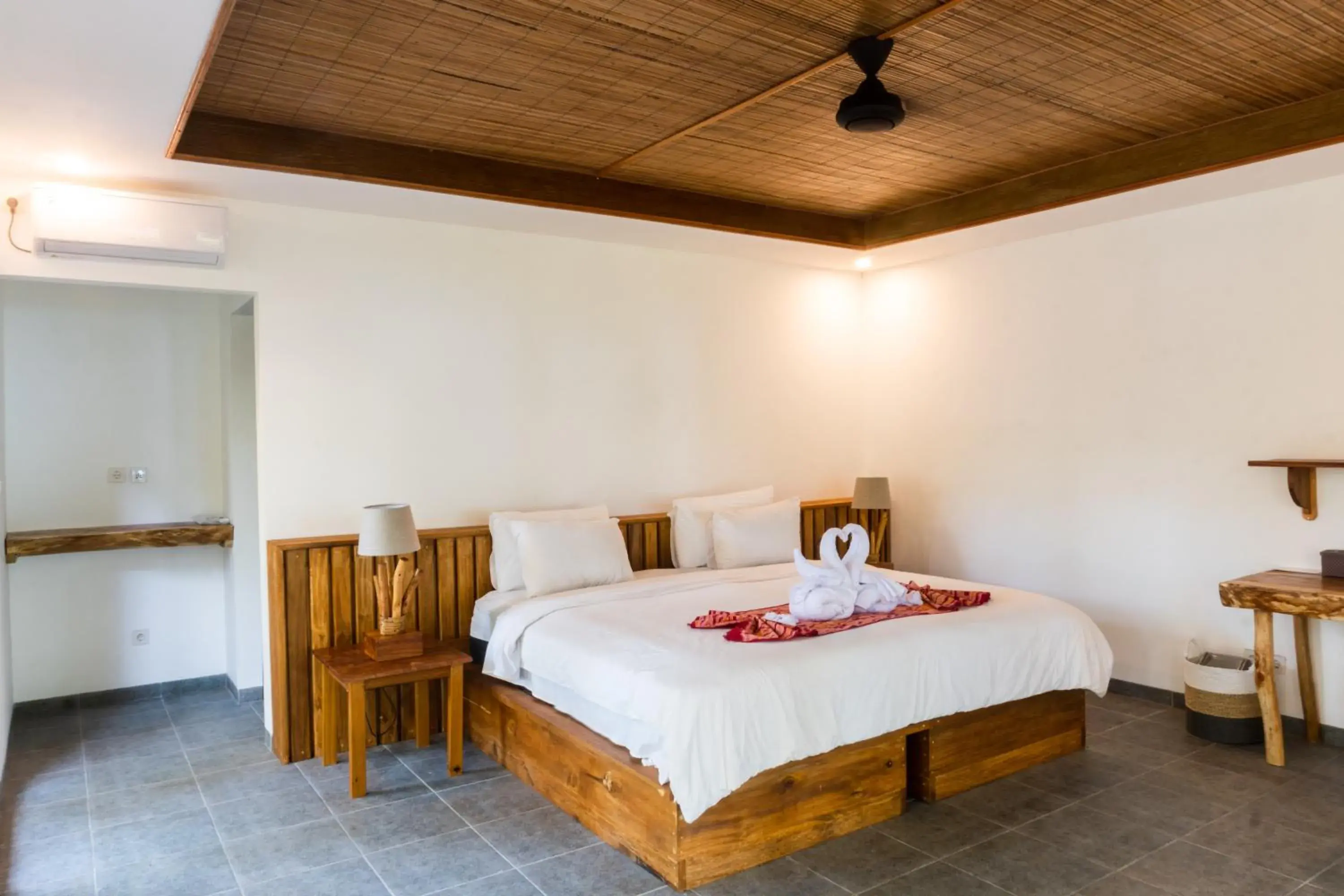 Bed in Murex Dive Resort Bed in Murex Dive Resort