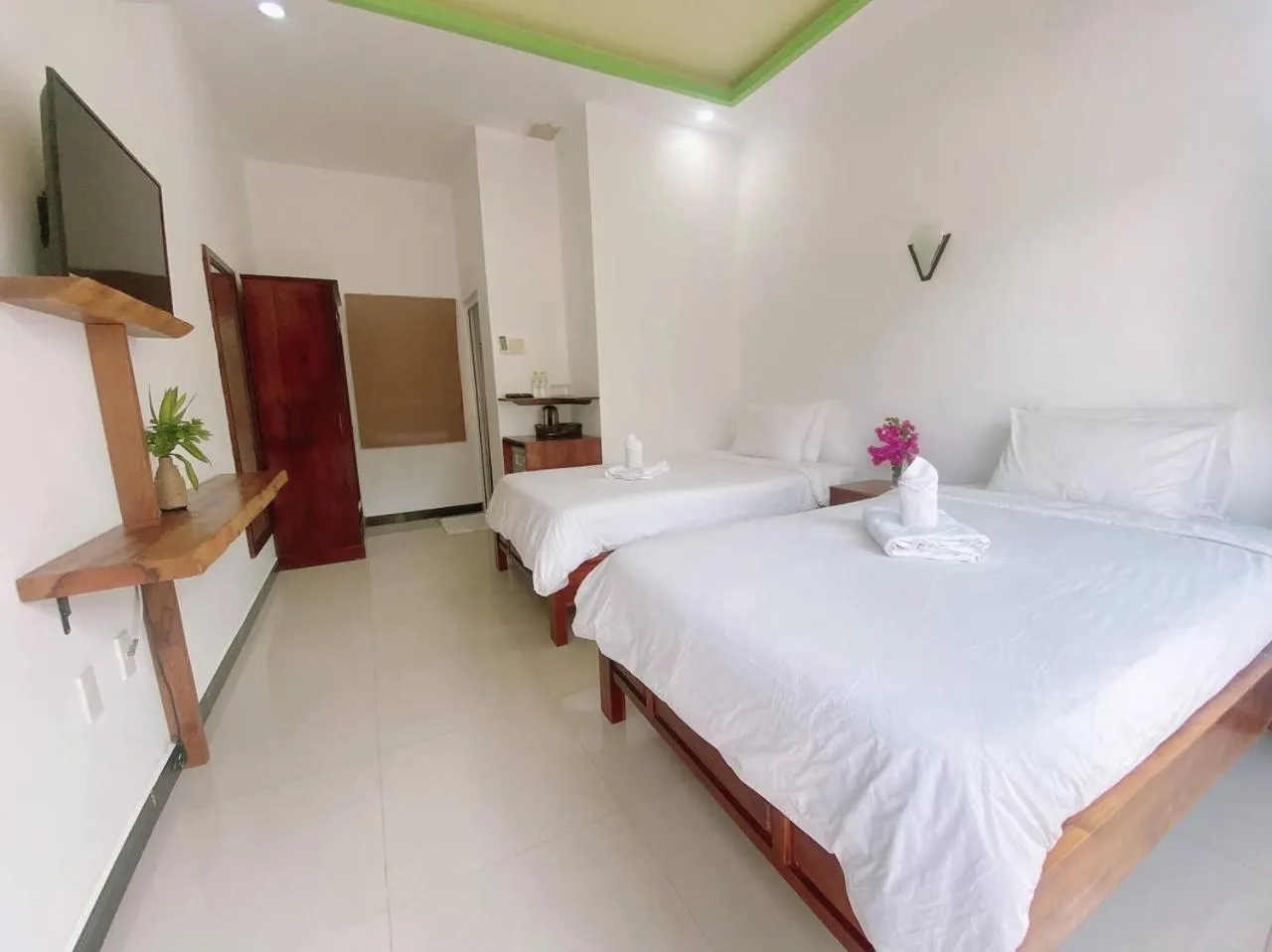Photo of the whole room, Bed in Tuong Vy Boutique Hotel Mui Ne