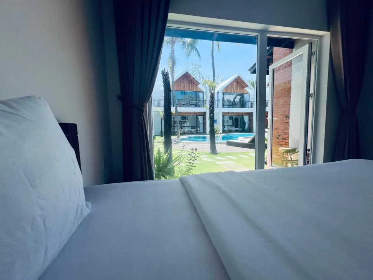 Pool view, Bed in Tuong Vy Boutique Hotel Mui Ne Pool view, Bed in Tuong Vy Boutique Hotel Mui Ne