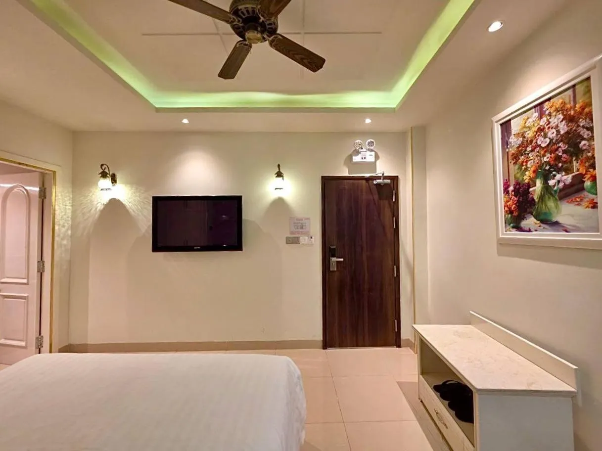 Bed in Tulip Hotel 3