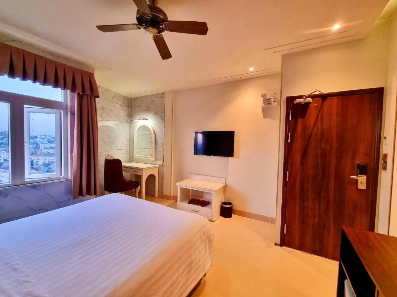 Bed in Tulip Hotel 3