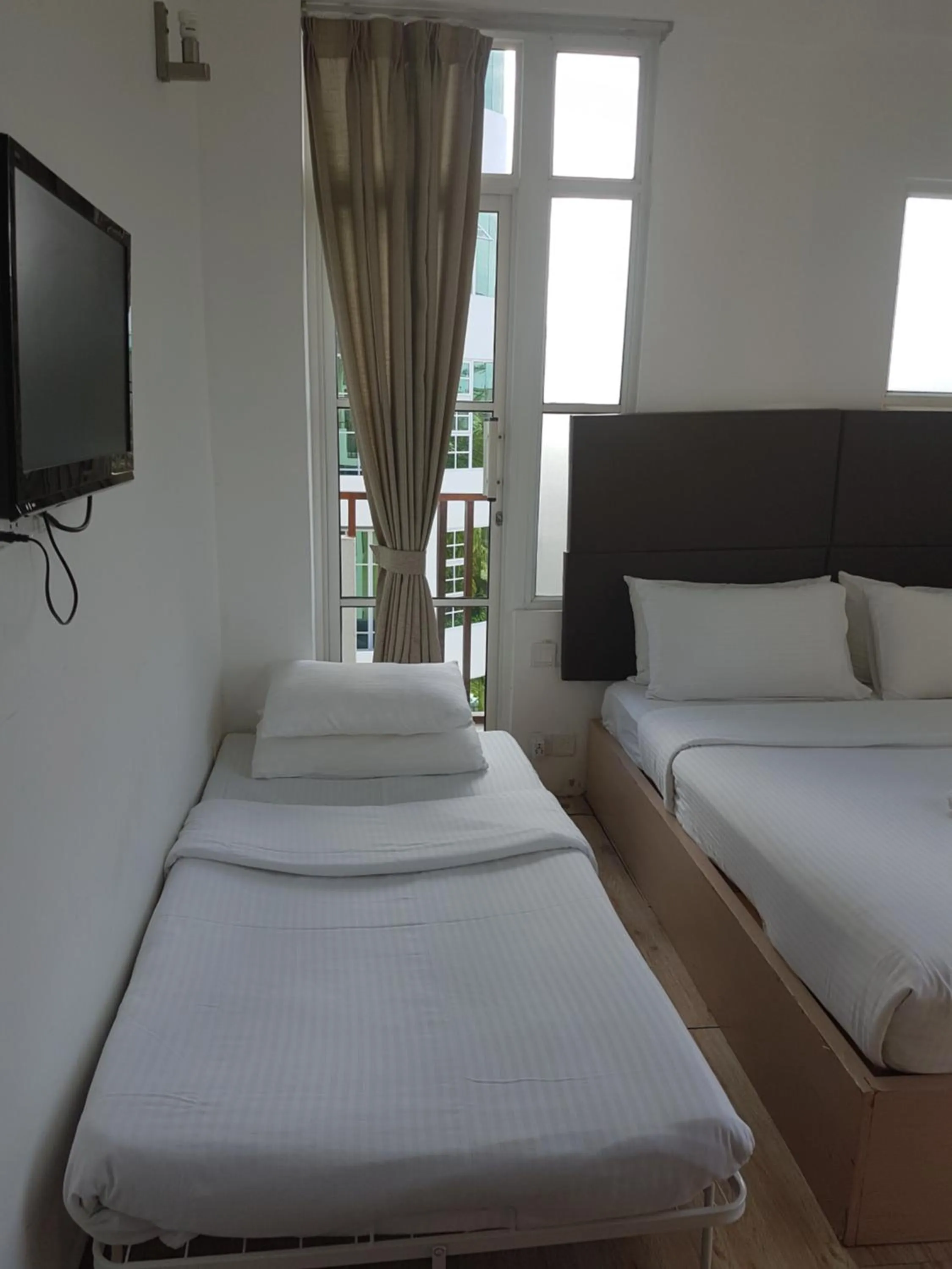 Balcony/Terrace, Bed in Express Inn at Hulhumale