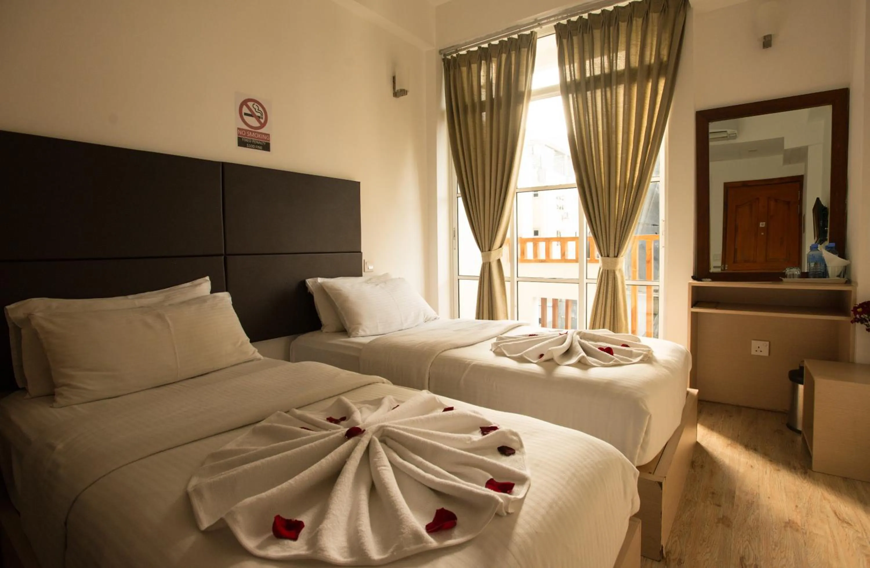 Photo of the whole room, Bed in Express Inn at Hulhumale