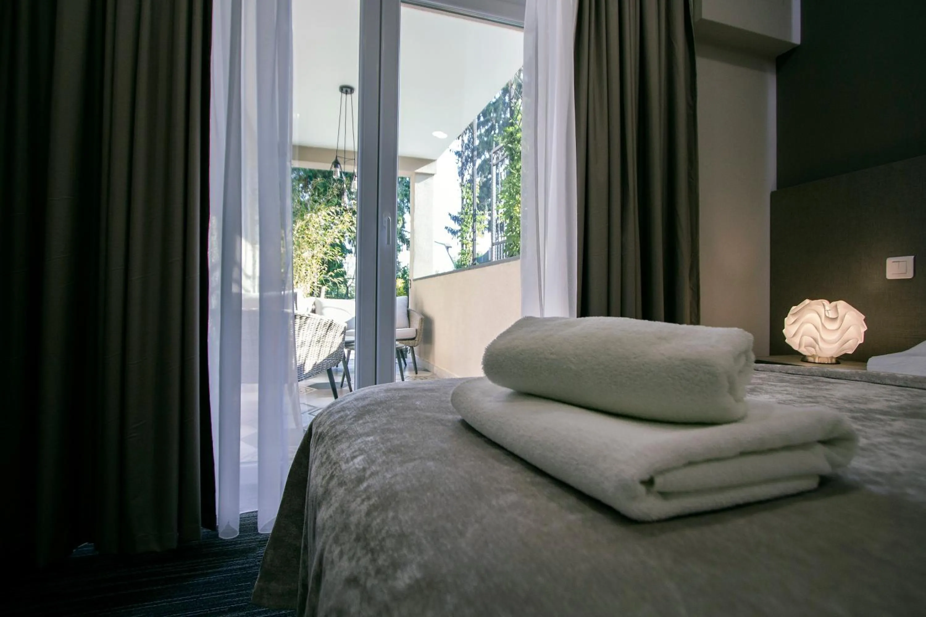 Bed in Sundial Boutique Hotel
