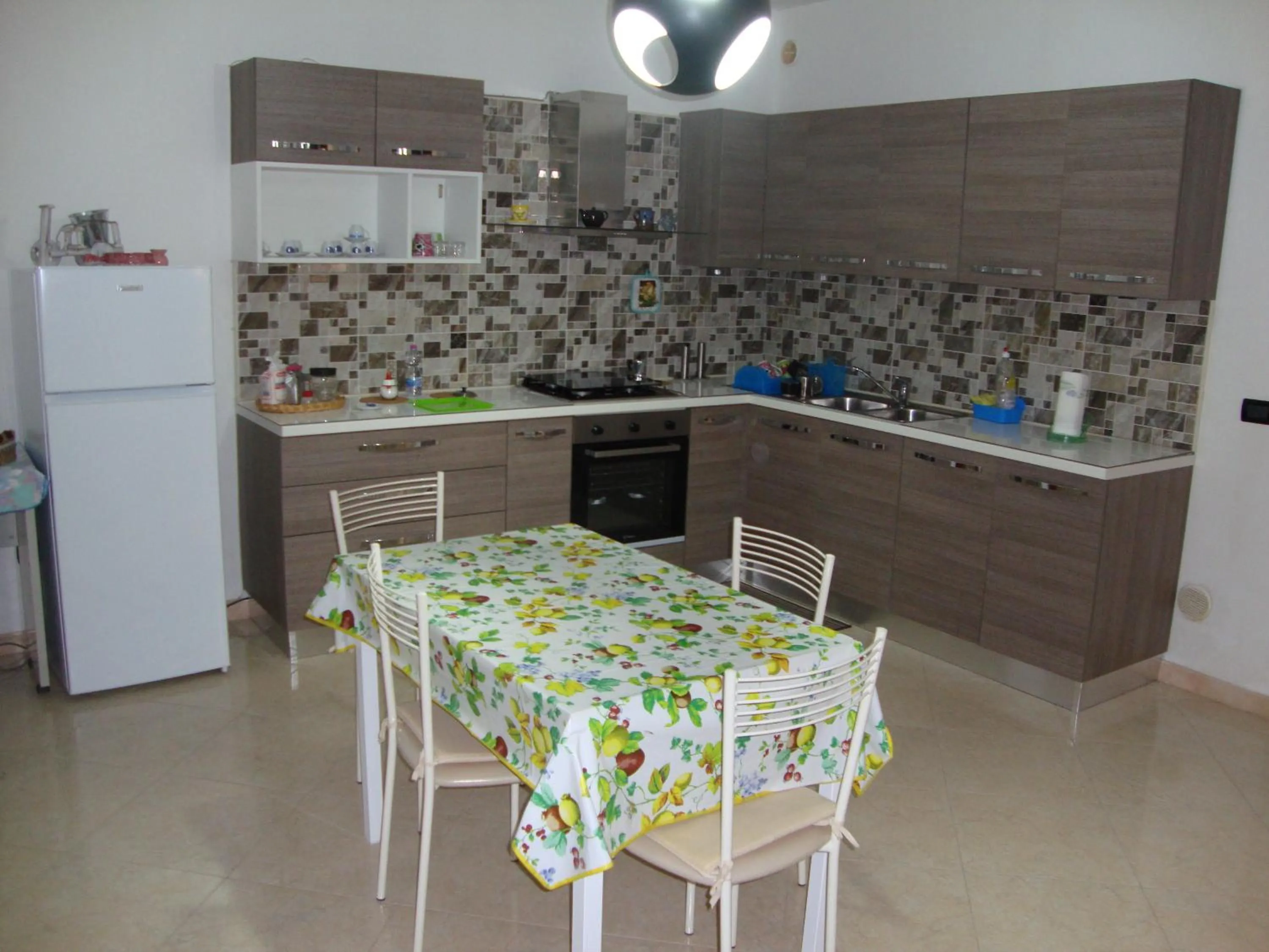 Kitchen or kitchenette in La Villa Bianca