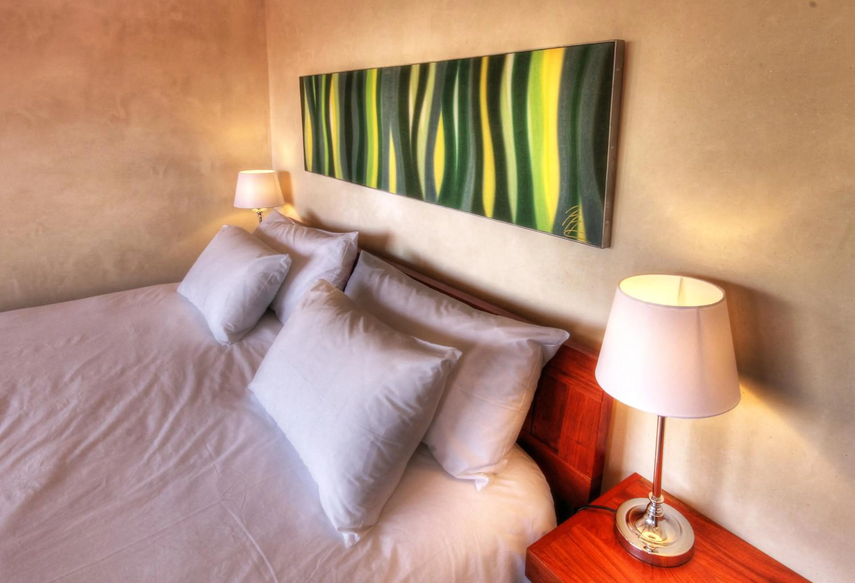 Bed in Hartmann Suites Serviced Self-Catering Apartments