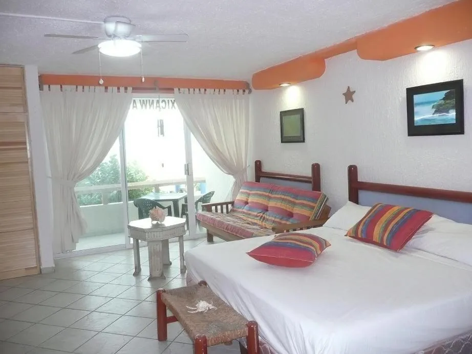Photo of the whole room, Bed in Cancun Beach ApartHotel by Solymar