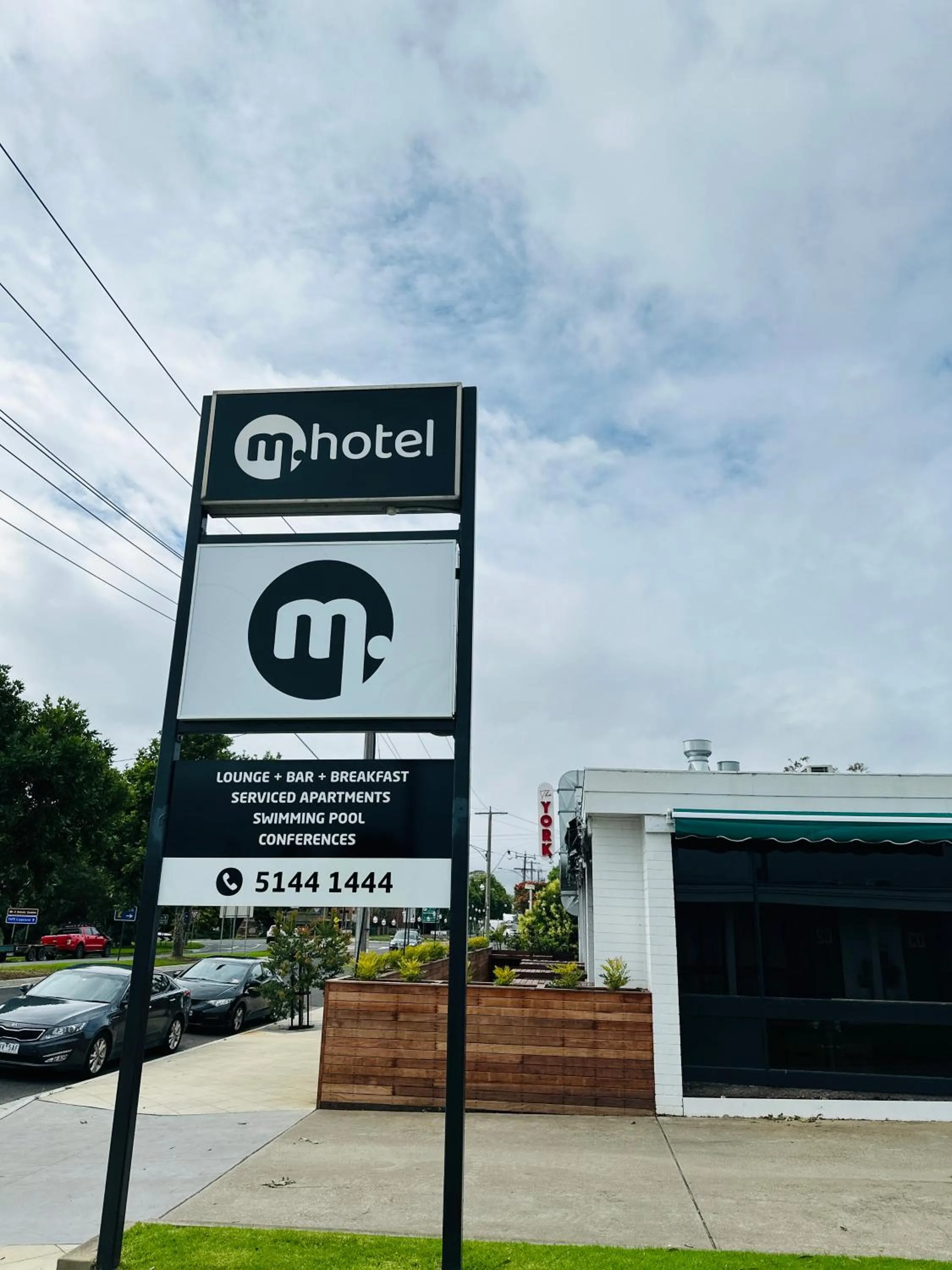 Property logo or sign in m hotel