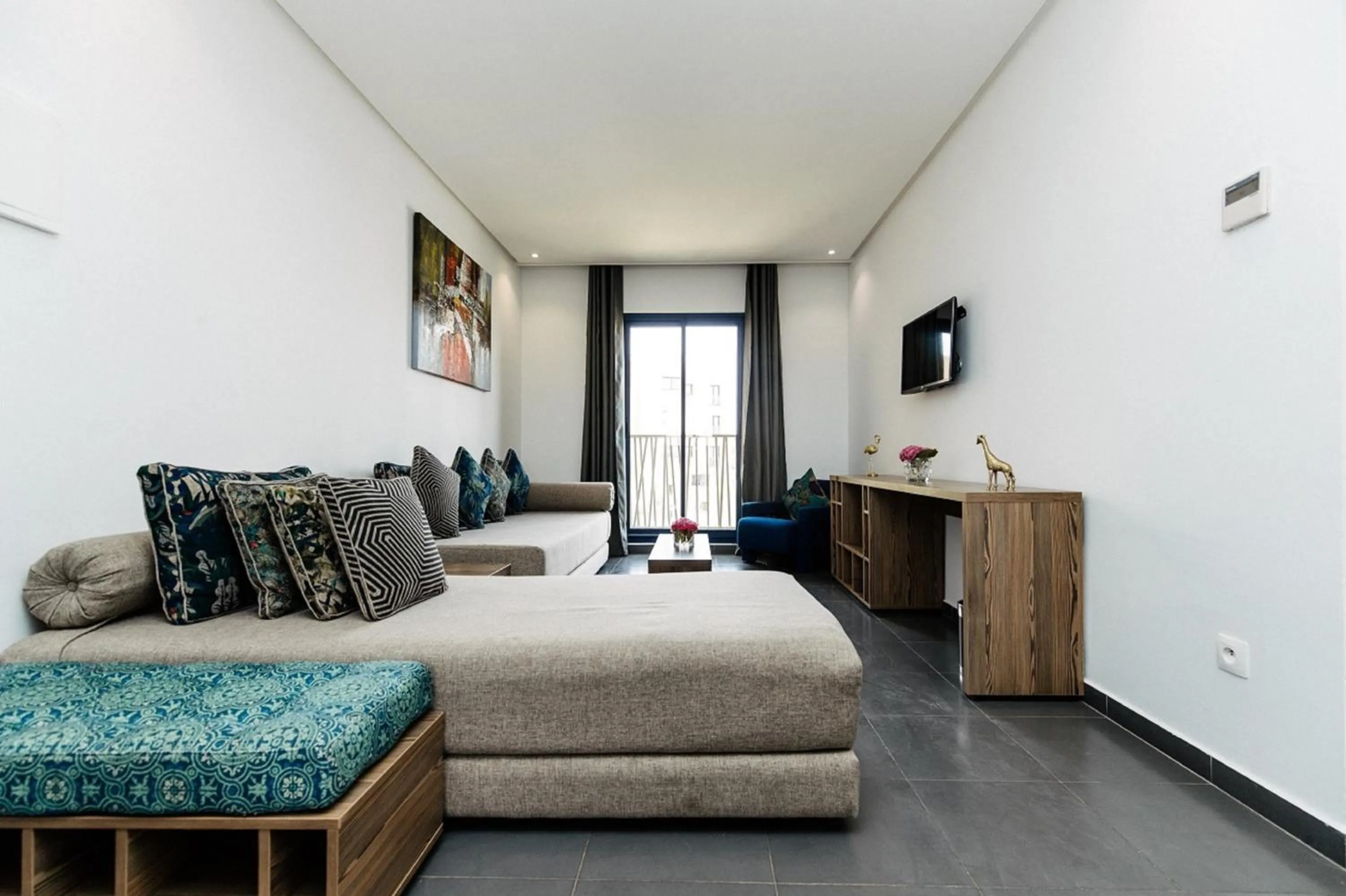 Living room, Bed in Wazo Appart-Hôtel