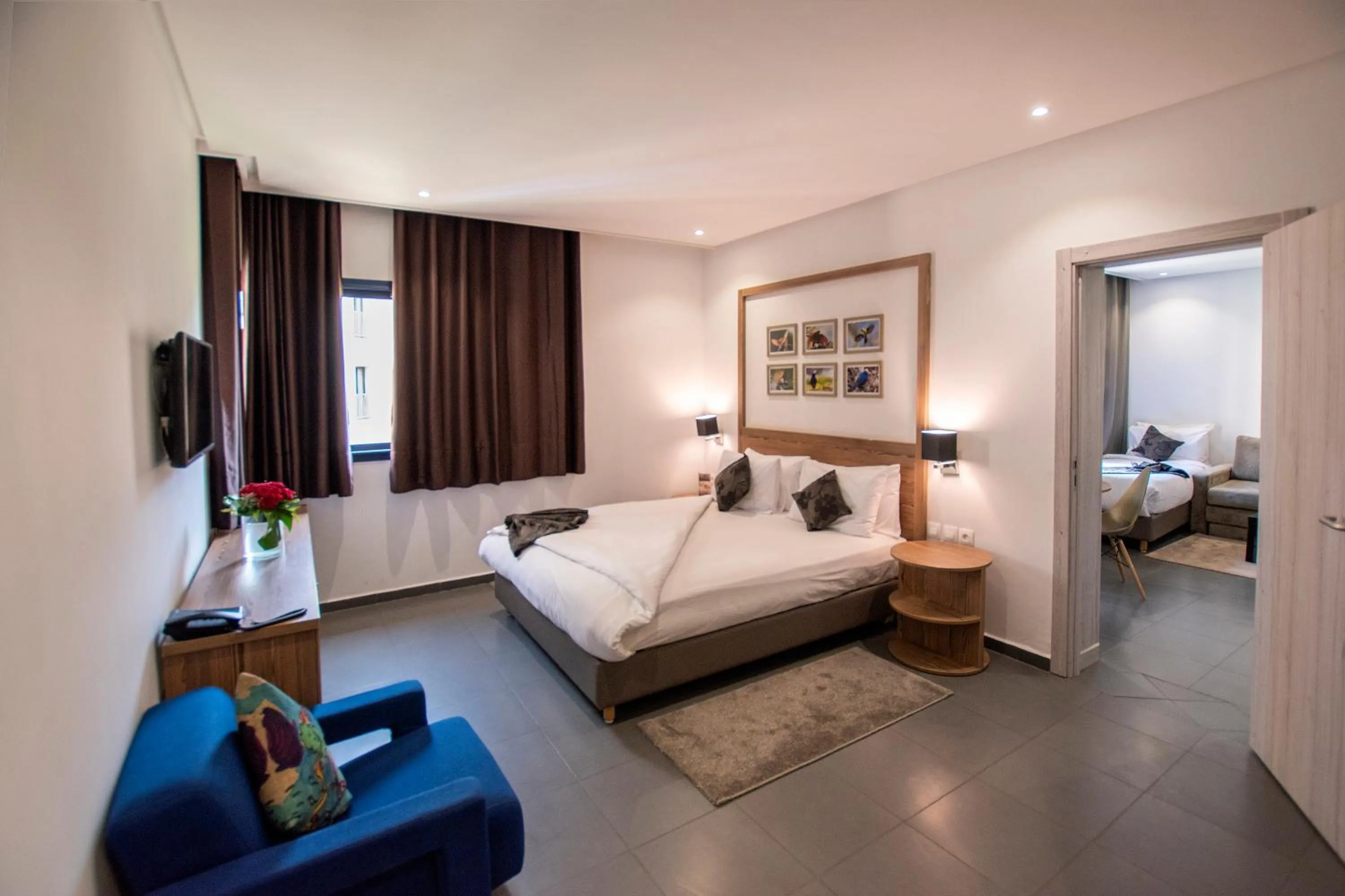 Living room, Bed in Wazo Appart-Hôtel