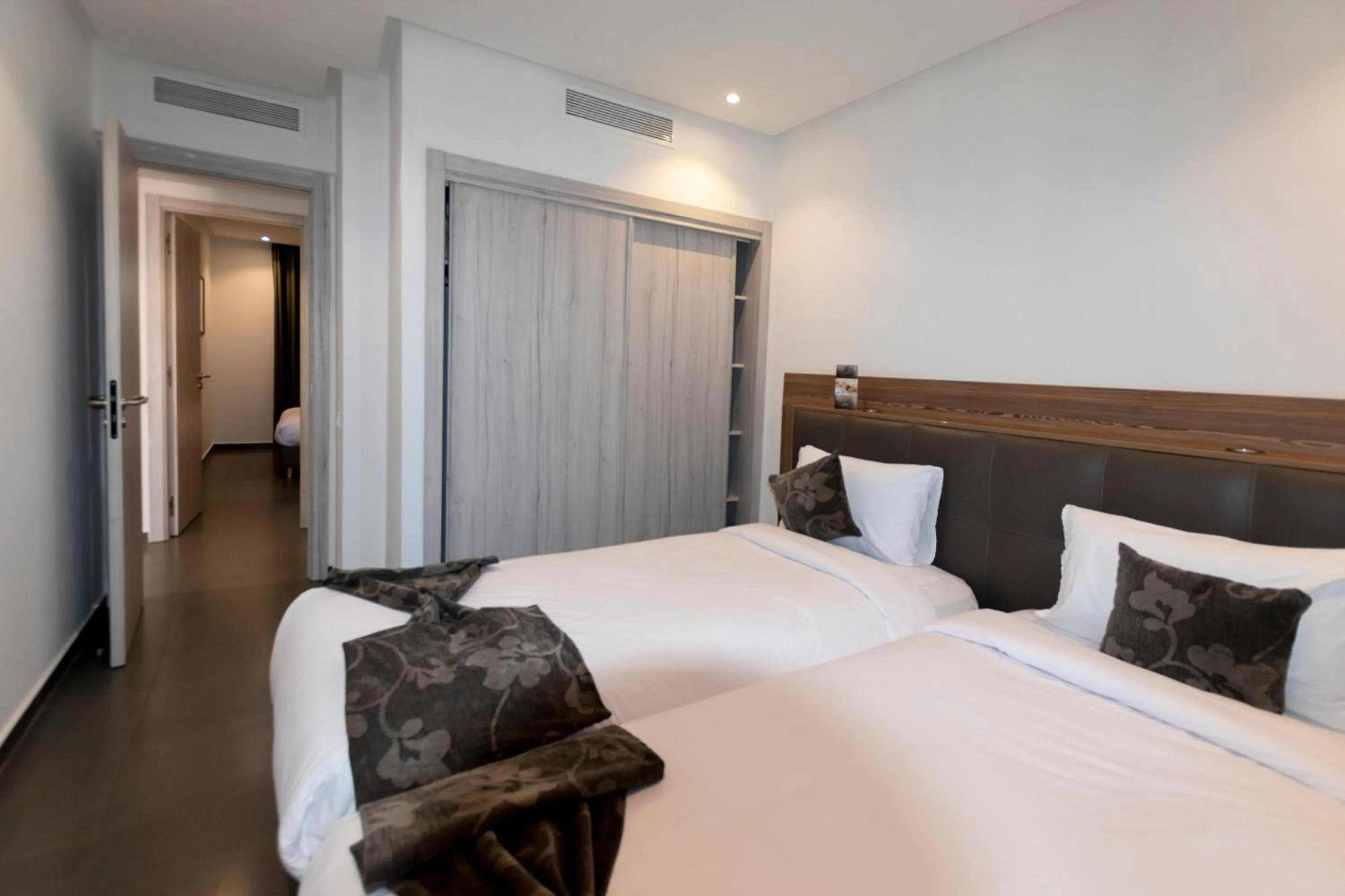 Bedroom, Bed in Wazo Appart-Hôtel