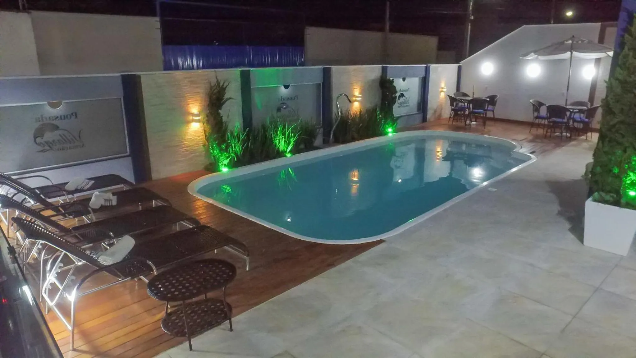 Swimming pool in Pousada Villarejo Armação