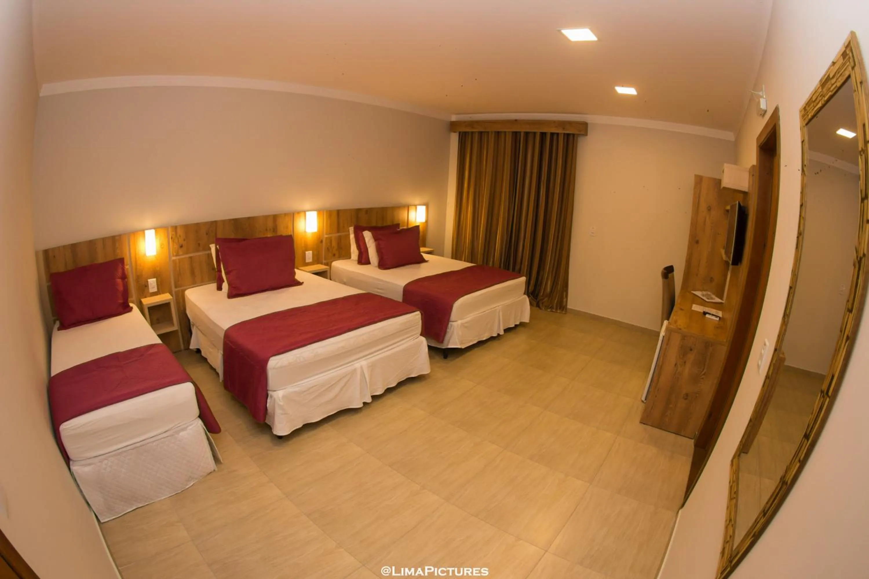 Bed in Pousada Villarejo Armação